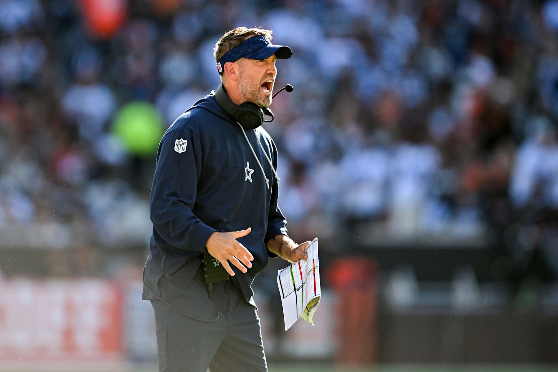 CLEVELAND, OHIO - SEPTEMBER 08: Offensive coordinator Brian Schottenheimer of the Dallas Cowboys celebrates a 3-yard touchdown run by Ezekiel Elliott during the second quarter against the Cleveland Browns at Huntington Bank Field on September 08, 2024 in Cleveland, Ohio. (Photo by Nick Cammett/Diamond Images via Getty Images)