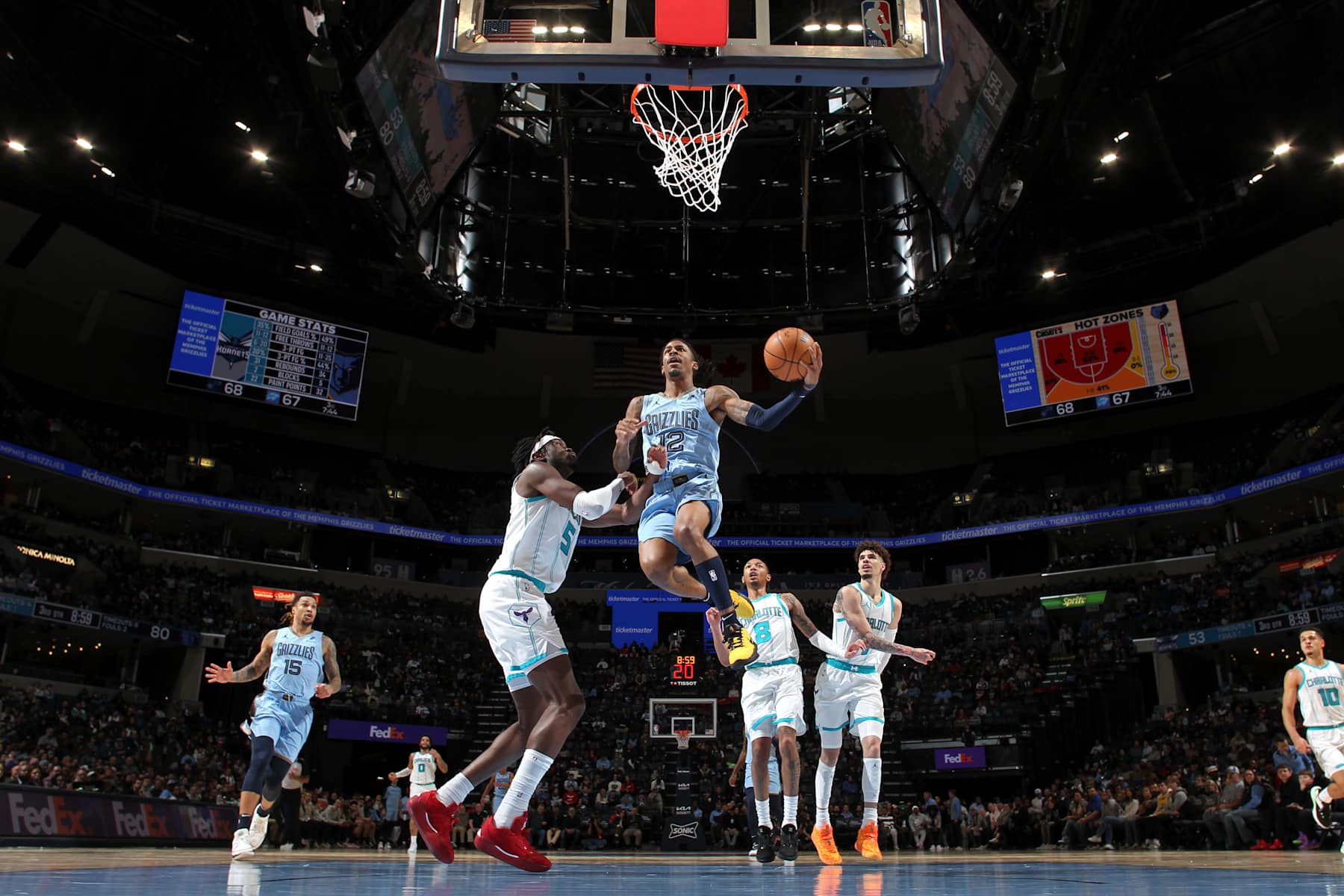 MEMPHIS, TN - JANUARY 22: Ja Morant #12 of the Memphis Grizzlies drives to the basket during the game against the Charlotte Hornets on January 22, 2025 at FedExForum in Memphis, Tennessee. NOTE TO USER: User expressly acknowledges and agrees that, by downloading and or using this photograph, User is consenting to the terms and conditions of the Getty Images License Agreement. Mandatory Copyright Notice: Copyright 2025 NBAE (Photo by Joe Murphy/NBAE via Getty Images)