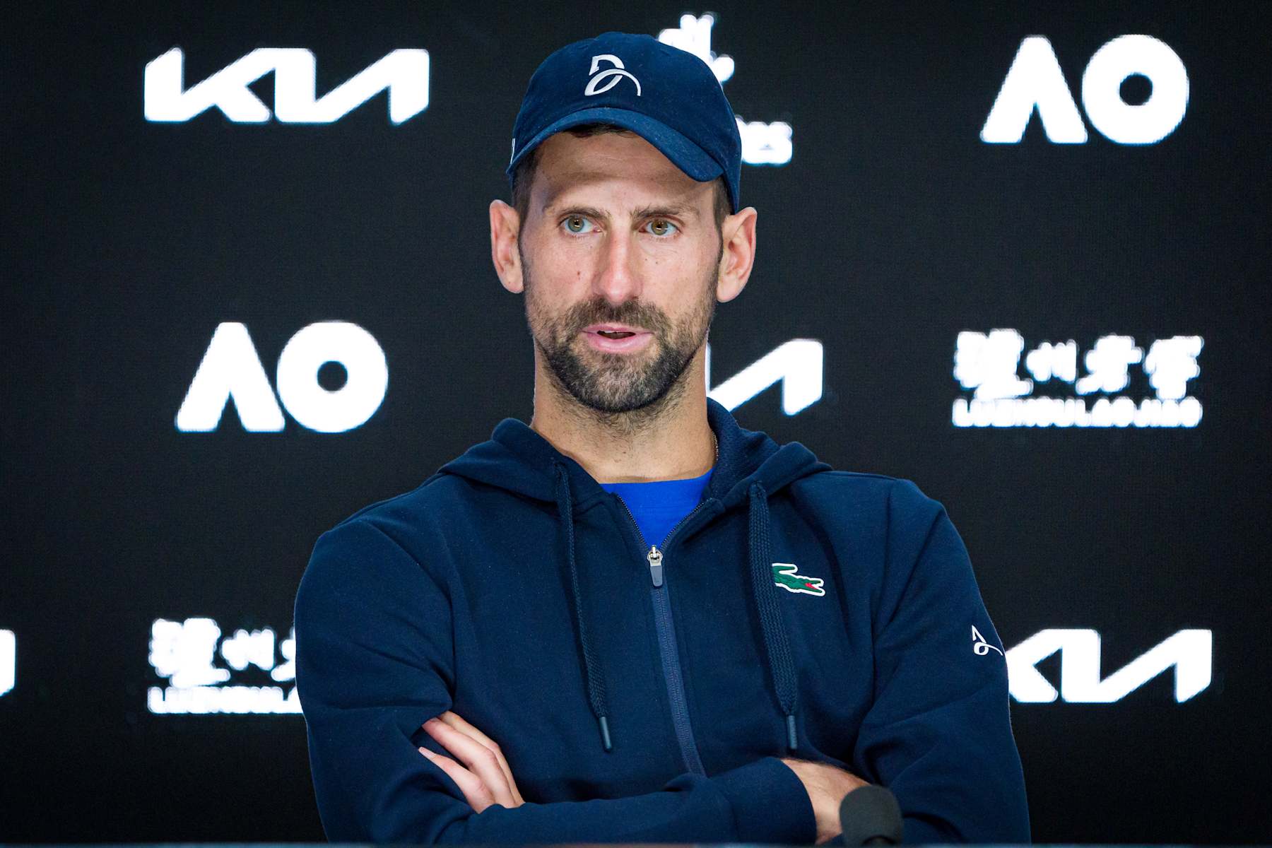 MELBOURNE, AUSTRALIA - JANUARY 24: Novak Djokovic of Serbia attends a press conference after retiring from the Men's Singles Semifinal against Alexander Zverev of Germany during day 13 of the 2025 Australian Open at Melbourne Park on January 24, 2025 in Melbourne, Australia. (Photo by Andy Cheung/Getty Images)
