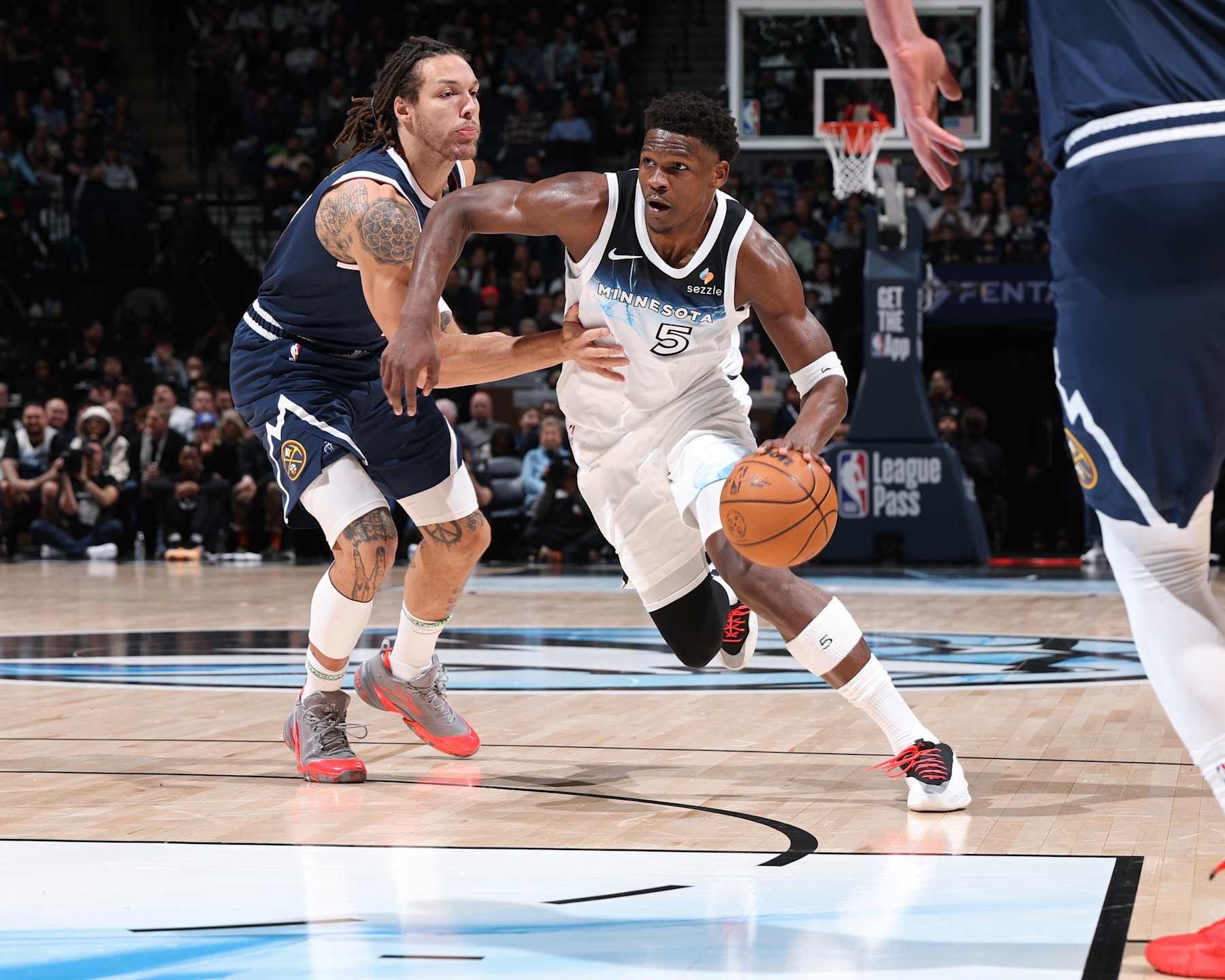 MINNEAPOLIS, MN - JANUARY 25: Anthony Edwards #5 of the Minnesota Timberwolves handles the ball during the game against the Denver Nuggets on January 25, 2025 at Target Center in Minneapolis, Minnesota. NOTE TO USER: User expressly acknowledges and agrees that, by downloading and or using this Photograph, user is consenting to the terms and conditions of the Getty Images License Agreement. Mandatory Copyright Notice: Copyright 2025 NBAE(Photo by David Sherman/NBAE via Getty Images)