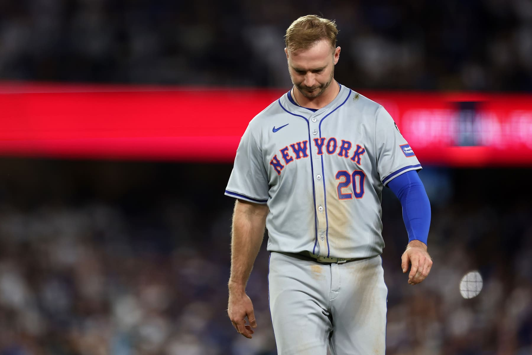 LOS ANGELES, CALIFORNIA - OCTOBER 20:  Pete Alonso #20 of the New York Mets reacts after a pop fly out with the bases loaded to end the 6th inning during Game Six of the National League Championship Series against the Los Angeles Dodgersat Dodger Stadium on October 20, 2024 in Los Angeles, California. (Photo by Harry How/Getty Images)