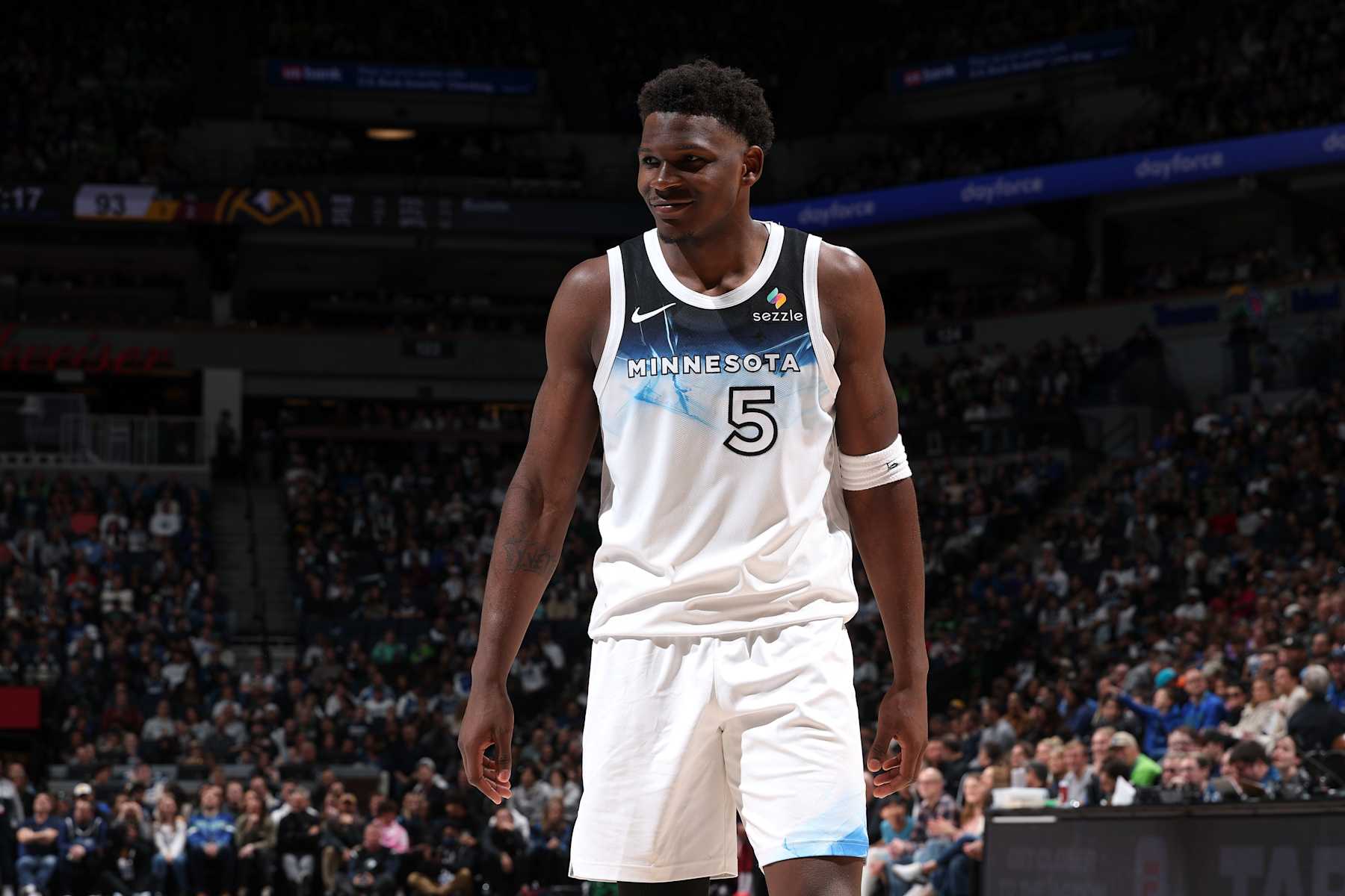 MINNEAPOLIS, MN - JANUARY 25: Anthony Edwards #5 of the Minnesota Timberwolves smiles during the game against the Denver Nuggets on January 25, 2025 at Target Center in Minneapolis, Minnesota. NOTE TO USER: User expressly acknowledges and agrees that, by downloading and or using this Photograph, user is consenting to the terms and conditions of the Getty Images License Agreement. Mandatory Copyright Notice: Copyright 2025 NBAE(Photo by David Sherman/NBAE via Getty Images)