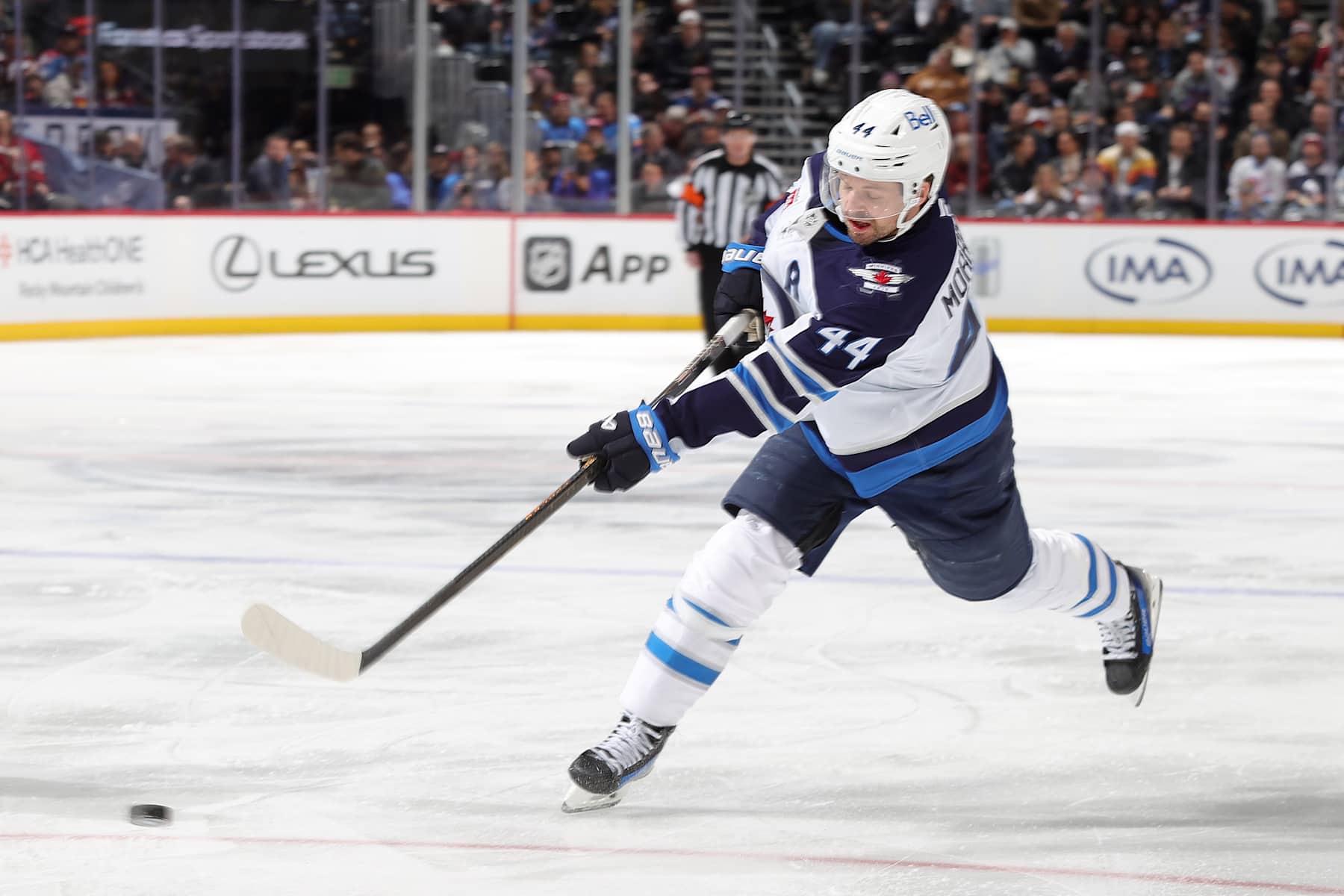 DENVER, COLORADO - JANUARY 22: Josh Morrissey #44 of the Winnipeg Jets shoots against the Colorado Avalanche at Ball Arena on January 22, 2025 in Denver, Colorado. (Photo by Michael Martin/NHLI via Getty Images)