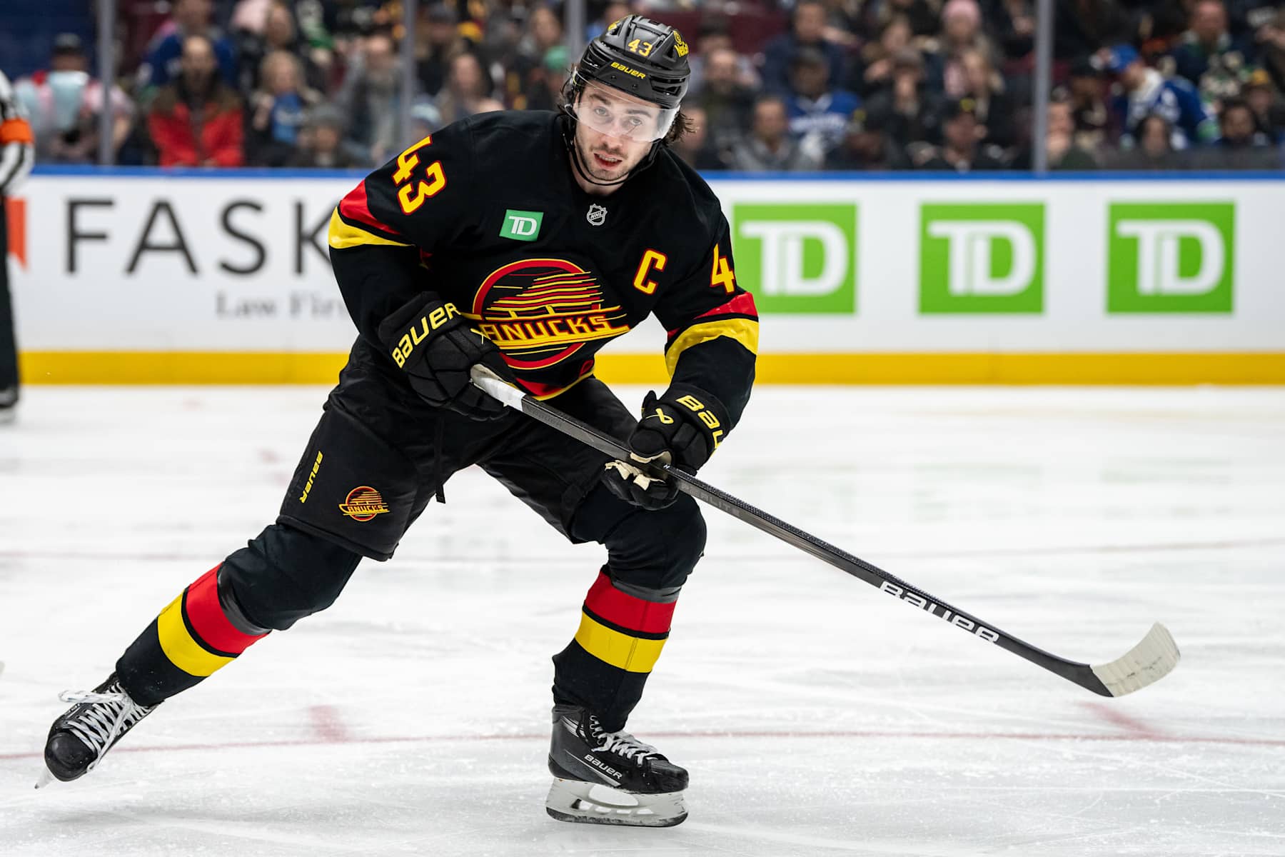 VANCOUVER, BC - JANUARY 21: Vancouver Canucks defenseman Quinn Hughes (43) skates up the ice during an NHL game between the Buffalo Sabres and the Vancouver Canucks on Tuesday, January 21, 2025 at Rogers Arena in Vancouver, B.C. (Photo by Ethan Cairns/Icon Sportswire via Getty Images)