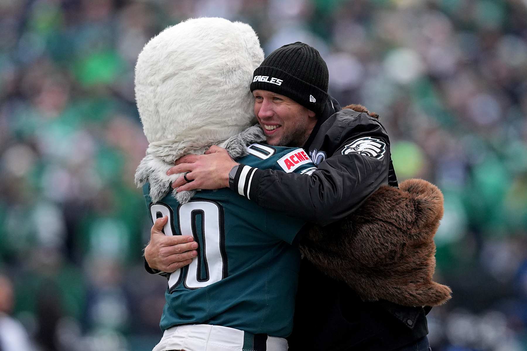 PHILADELPHIA, PENNSYLVANIA - JANUARY 26: Former quarterback Nick Foles hugs the Philadelphia Eagles mascot prior to the NFC Championship Game against the Washington Commanders at Lincoln Financial Field on January 26, 2025 in Philadelphia, Pennsylvania.  (Photo by Mitchell Leff/Getty Images)