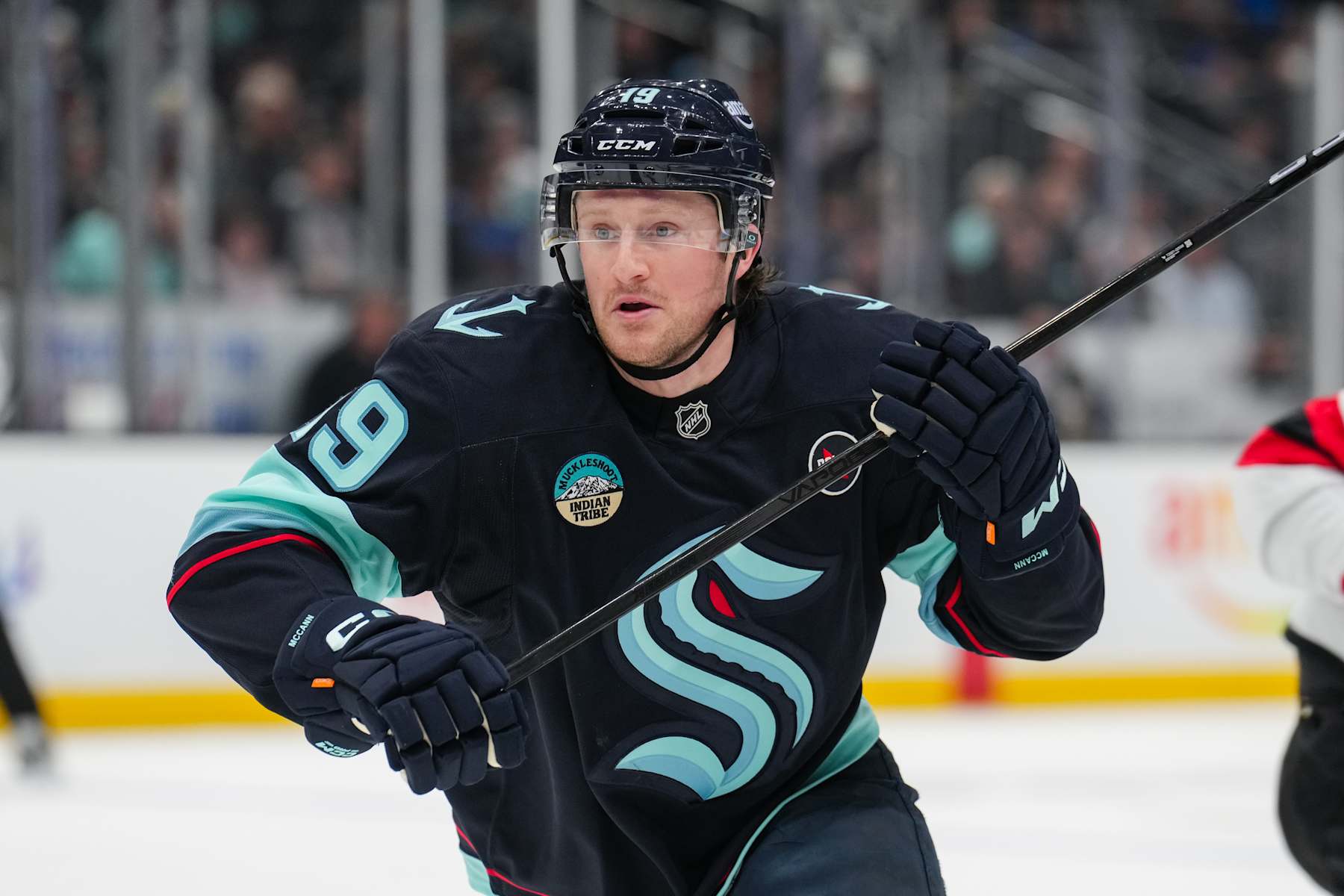 SEATTLE, WASHINGTON - JANUARY 06: Jared McCann #19 of the Seattle Kraken skates during the first period of a game against the New Jersey Devils at Climate Pledge Arena on January 06, 2025 in Seattle, Washington. (Photo by Christopher Mast/NHLI via Getty Images)