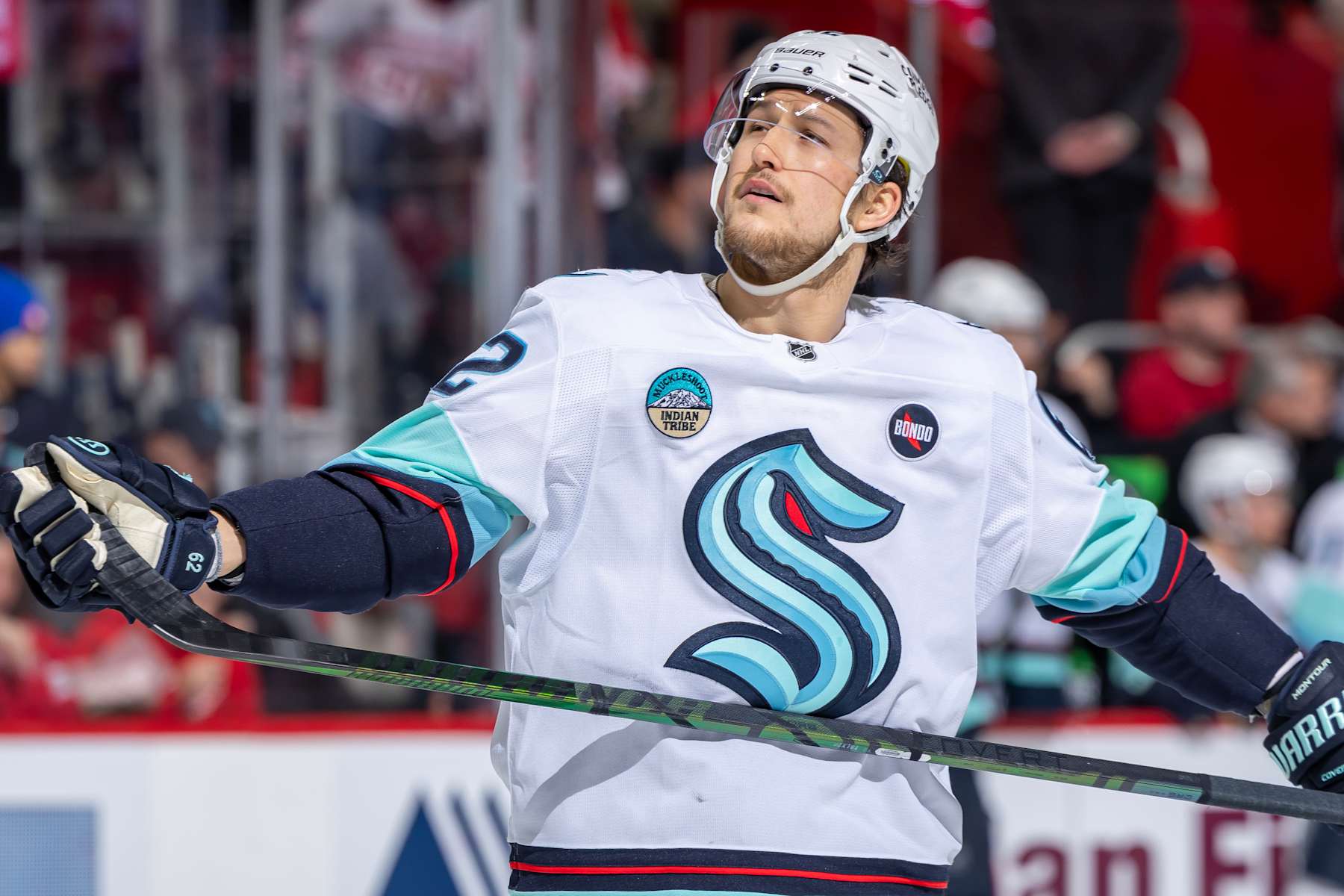 DETROIT, MICHIGAN - JANUARY 12: Brandon Montour #62 of the Seattle Kraken skates around on a play stoppage against the Detroit Red Wings during the first period at Little Caesars Arena on January 12, 2024 in Detroit, Michigan. Detroit defeated Seattle 6-2. (Photo by Dave Reginek/NHLI via Getty Images)