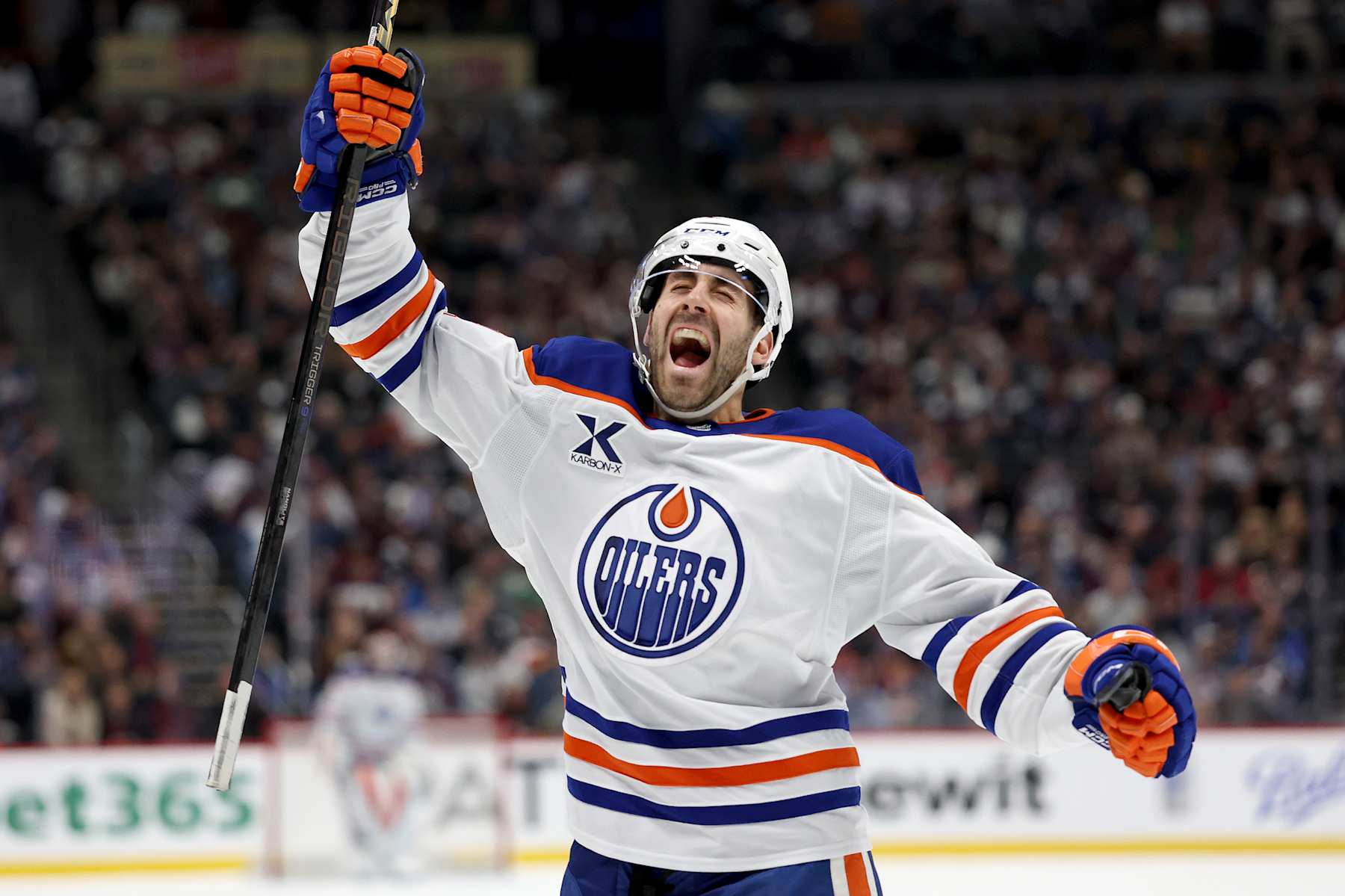 DENVER, COLORADO - JANUARY 16: Evan Bouchard #2 of the Edmonton Oilers celebrates scoring the winning goal against the Colorado Avalanche in the third period at Ball Arena on January 16, 2025 in Denver, Colorado. (Photo by Matthew Stockman/Getty Images)