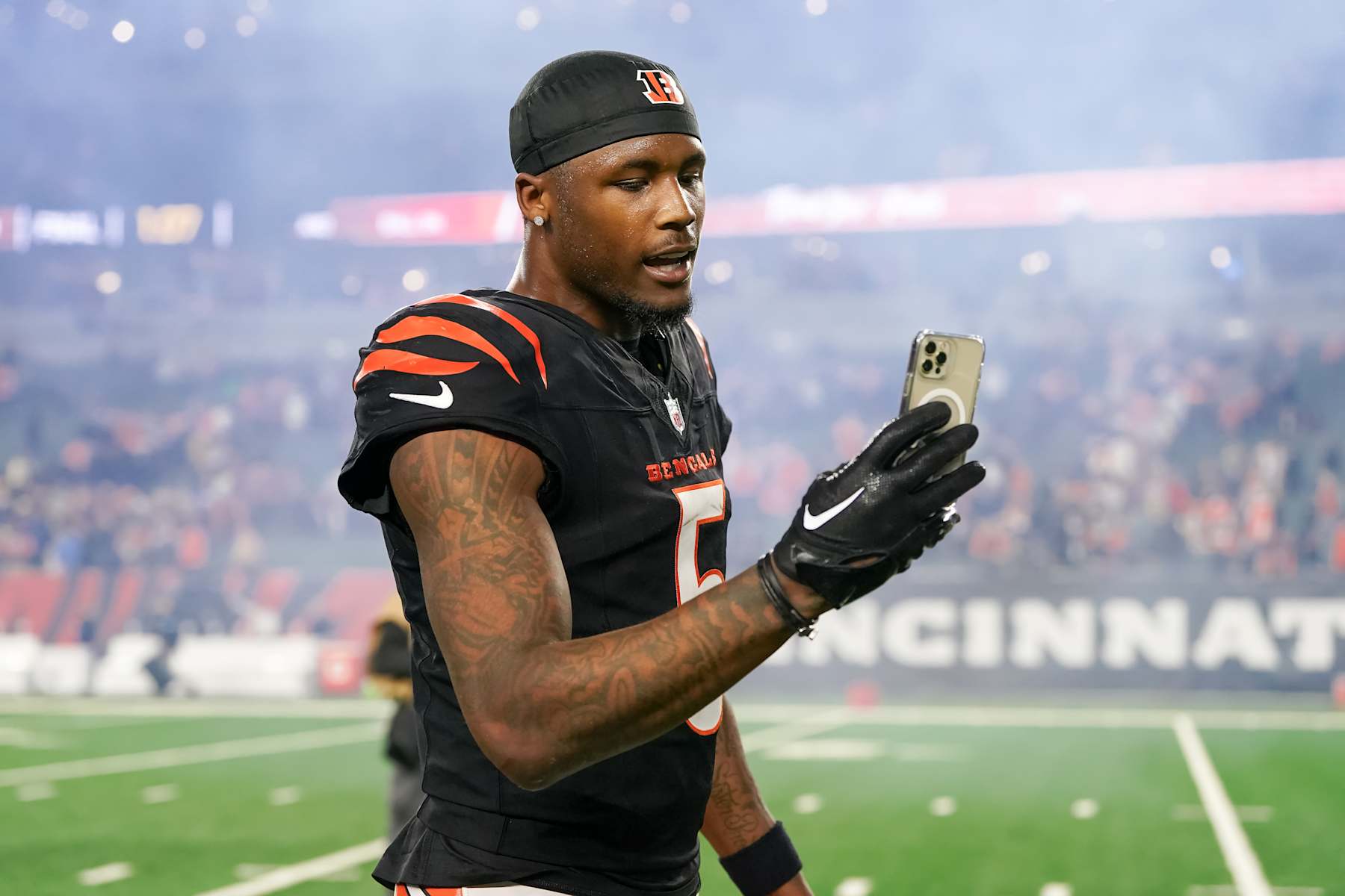 CINCINNATI, OHIO - DECEMBER 28: Tee Higgins #5 of the Cincinnati Bengals celebrates after beating the Denver Broncos 30-24 in overtime at Paycor Stadium on December 28, 2024 in Cincinnati, Ohio. (Photo by Dylan Buell/Getty Images)