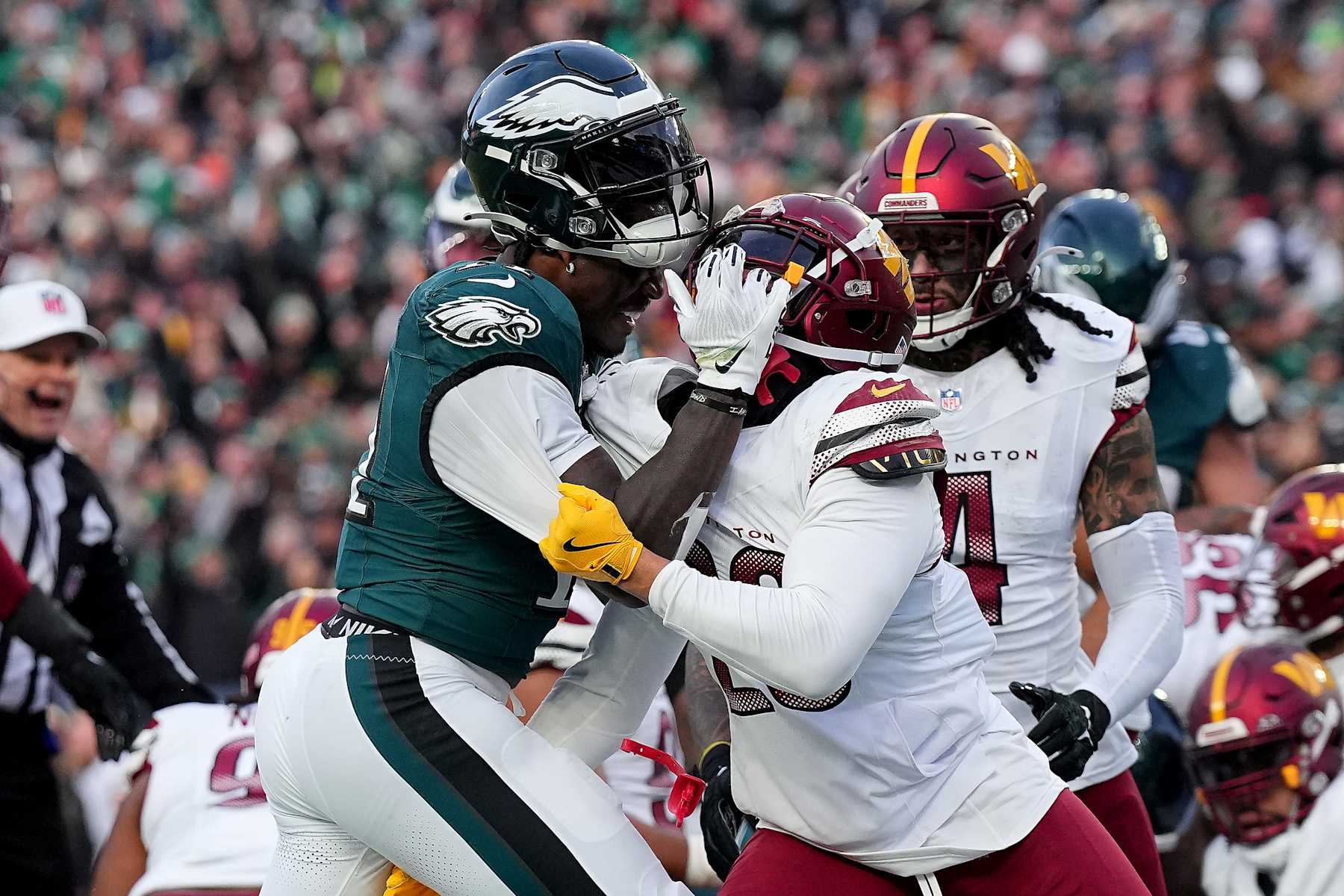PHILADELPHIA, PENNSYLVANIA - JANUARY 26: A.J. Brown #11 of the Philadelphia Eagles and Marshon Lattimore #23 of the Washington Commanders get into an altercation during the second quarter in the NFC Championship Game at Lincoln Financial Field on January 26, 2025 in Philadelphia, Pennsylvania.  (Photo by Mitchell Leff/Getty Images)