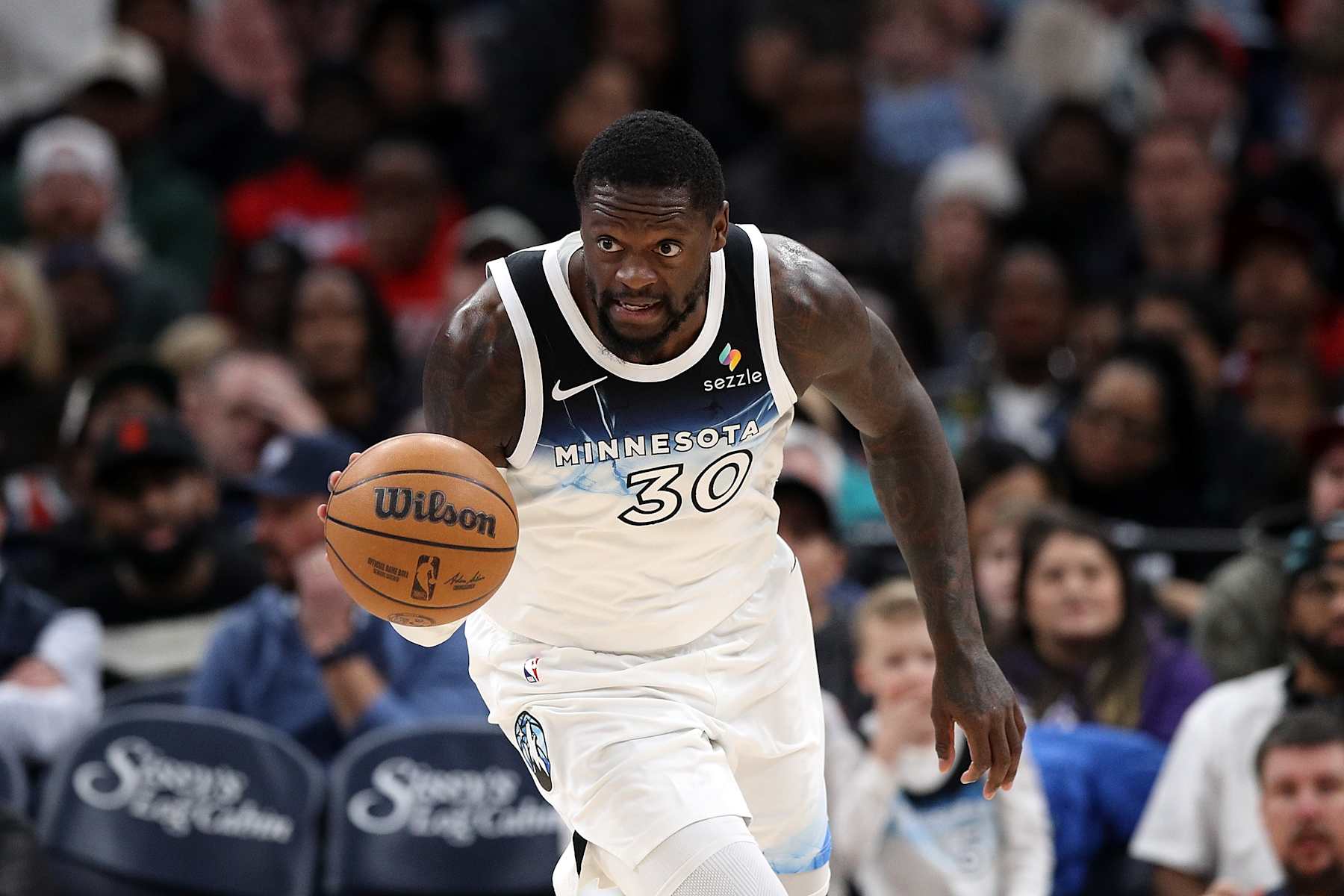 MEMPHIS, TENNESSEE - JANUARY 20: Julius Randle #30 of the Minnesota Timberwolves brings the ball up court during the game against the Memphis Grizzlies at FedExForum on January 20, 2025 in Memphis, Tennessee. NOTE TO USER: User expressly acknowledges and agrees that, by downloading and or using this photograph, User is consenting to the terms and conditions of the Getty Images License Agreement. (Photo by Justin Ford/Getty Images)