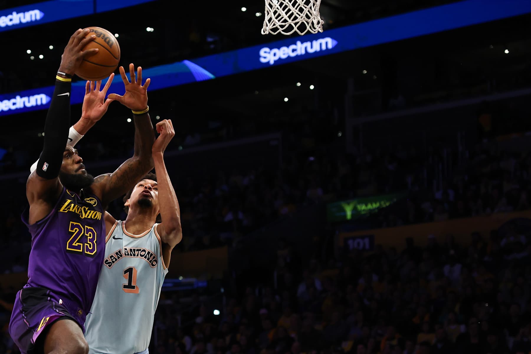 LOS ANGELES, CALIFORNIA - JANUARY 13: LeBron James #23 of the Los Angeles Lakers drives to the basket against Victor Wembanyama #1 of the San Antonio Spurs during the second quarter at Crypto.com Arena on January 13, 2025 in Los Angeles, California. NOTE TO USER: User expressly acknowledges and agrees that, by downloading and/or using this Photograph, user is consenting to the terms and conditions of the Getty Images License Agreement.  (Photo by Katelyn Mulcahy/Getty Images)