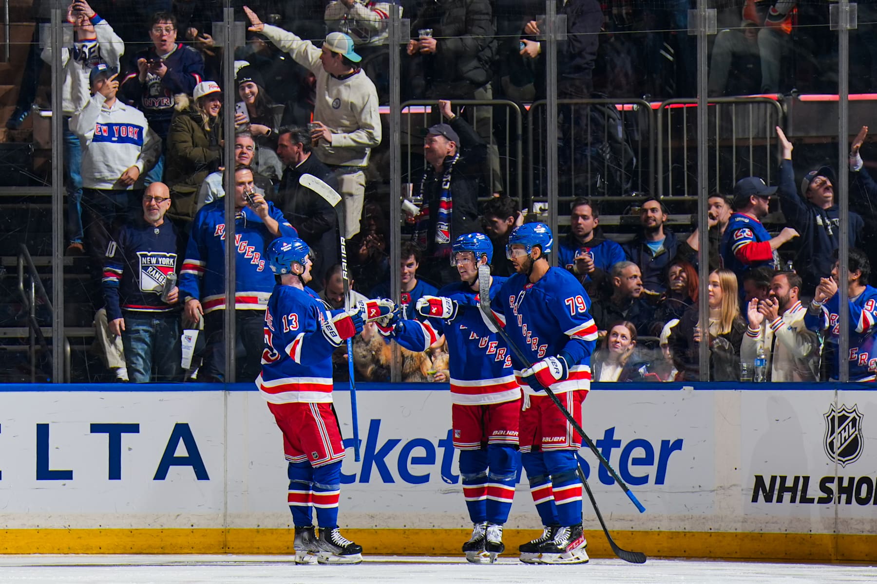 NEW YORK, NEW YORK - JANUARY 23: K'Andre Miller #79 of the New York Rangers celebrates with teammates after scoring a goal in the second period against the Philadelphia Flyers at Madison Square Garden on January 23, 2025 in New York City. (Photo by Jared Silber/NHLI via Getty Images)