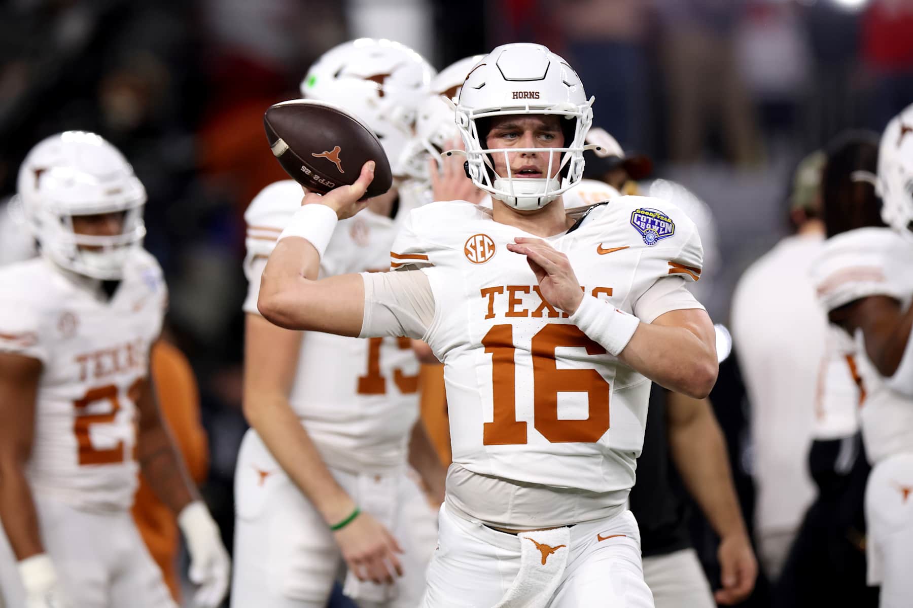 ARLINGTON, TEXAS - JANUARY 10: Arch Manning #16 of the Texas Longhorns warms up before the Goodyear Cotton Bowl against the Ohio State Buckeyes at AT&T Stadium on January 10, 2025 in Arlington, Texas. (Photo by Sam Hodde/Getty Images)
