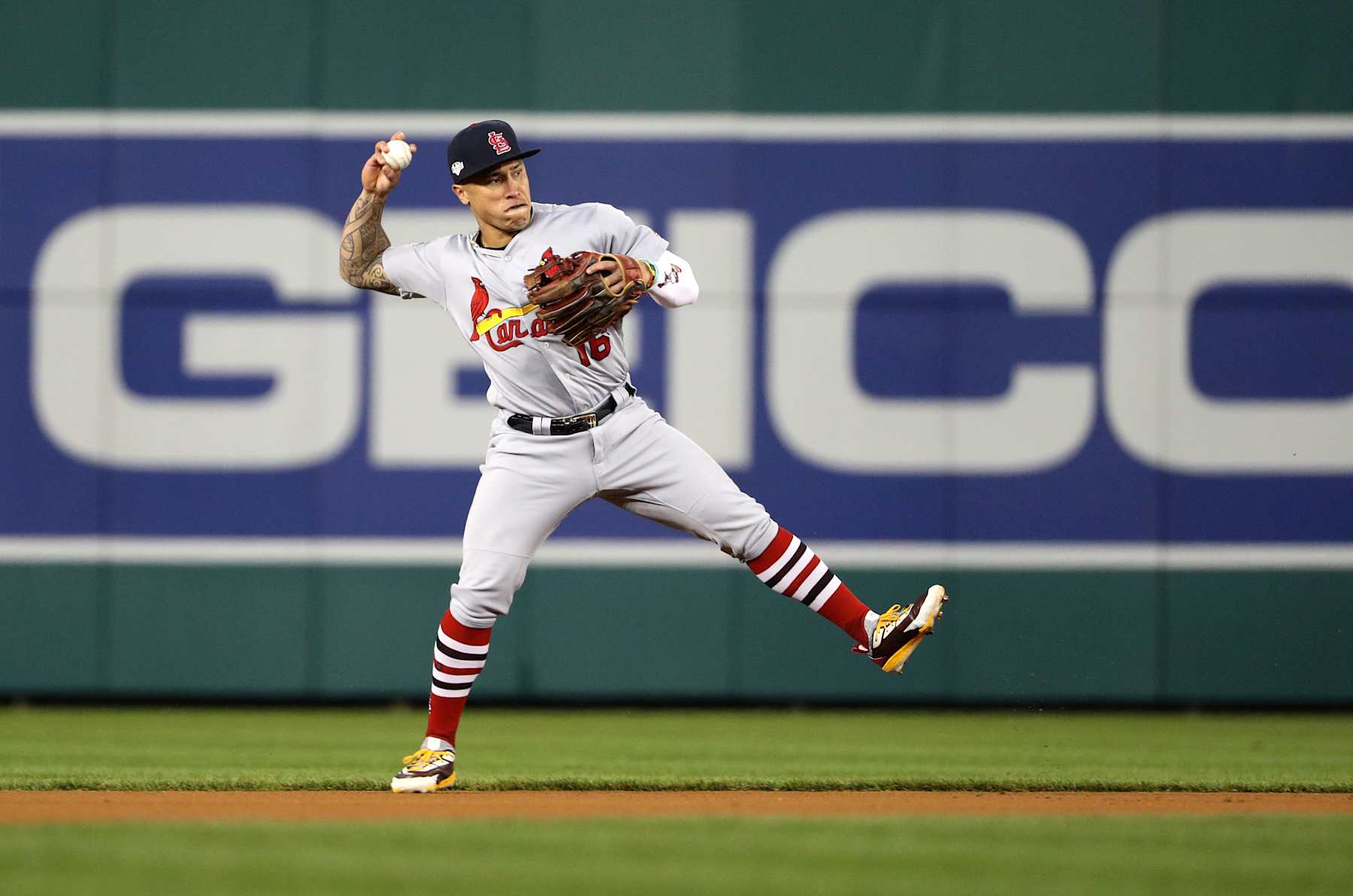 WASHINGTON, DC - OCTOBER 14: Kolten Wong #16 of the St. Louis Cardinals fields the ball for an out on Trea Turner #7 of the Washington Nationals during the first inning of game three of the National League Championship Series at Nationals Park on October 14, 2019 in Washington, DC. (Photo by Patrick Smith/Getty Images)