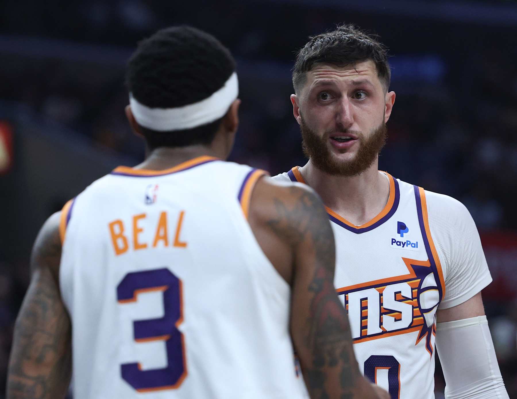 LOS ANGELES, CALIFORNIA - APRIL 10: Jusuf Nurkic #20 of the Phoenix Suns talks with Bradley Beal #3 during a 124-108 win over the LA Clippers at Crypto.com Arena on April 10, 2024 in Los Angeles, California. User is consenting to the terms and conditions of the Getty Images License Agreement. (Photo by Harry How/Getty Images)