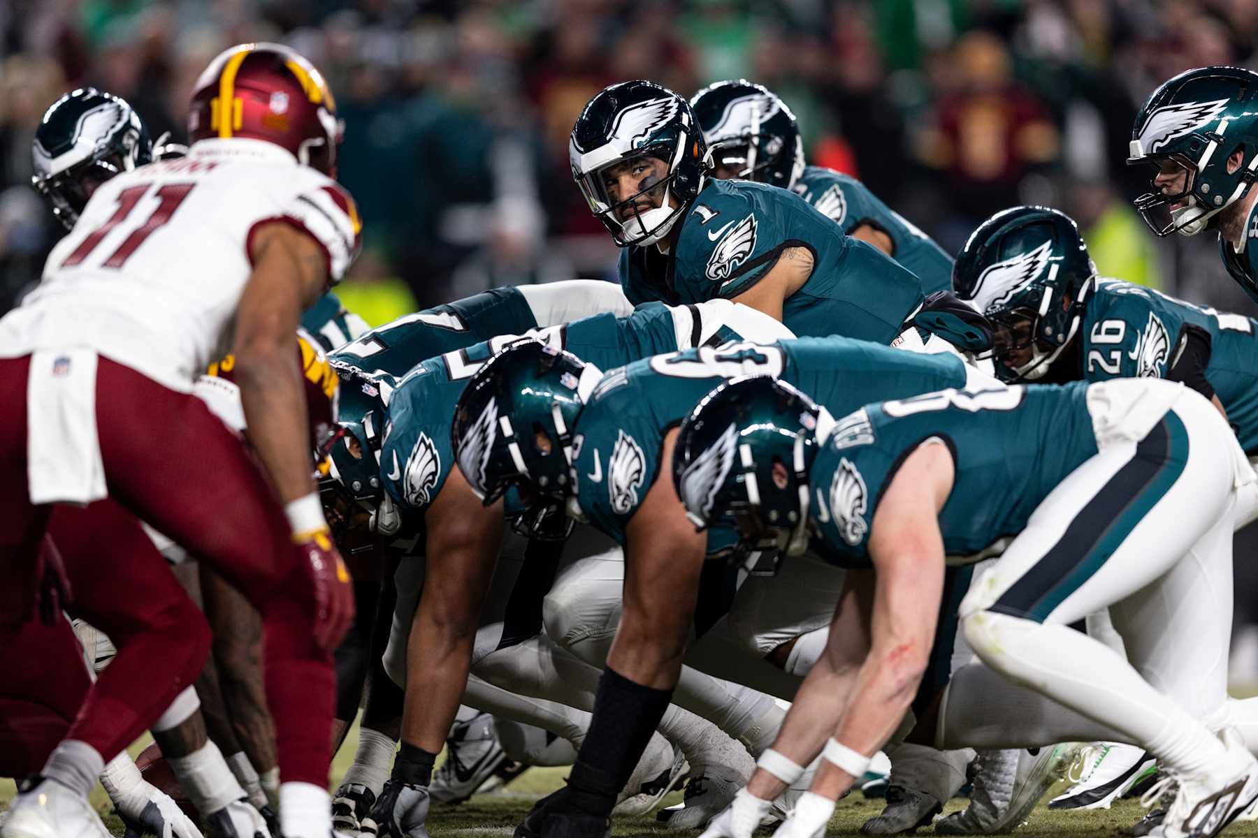 PHILADELPHIA, PENNSYLVANIA - JANUARY 26: Jalen Hurts #1 of the Philadelphia Eagles looks at the referee in the third quarter of the game against the Washington Commanders at Lincoln Financial Field on January 26, 2025 in Philadelphia, Pennsylvania. The Eagles beat the Commanders 55-23. (Photo by Lauren Leigh Bacho/Getty Images)