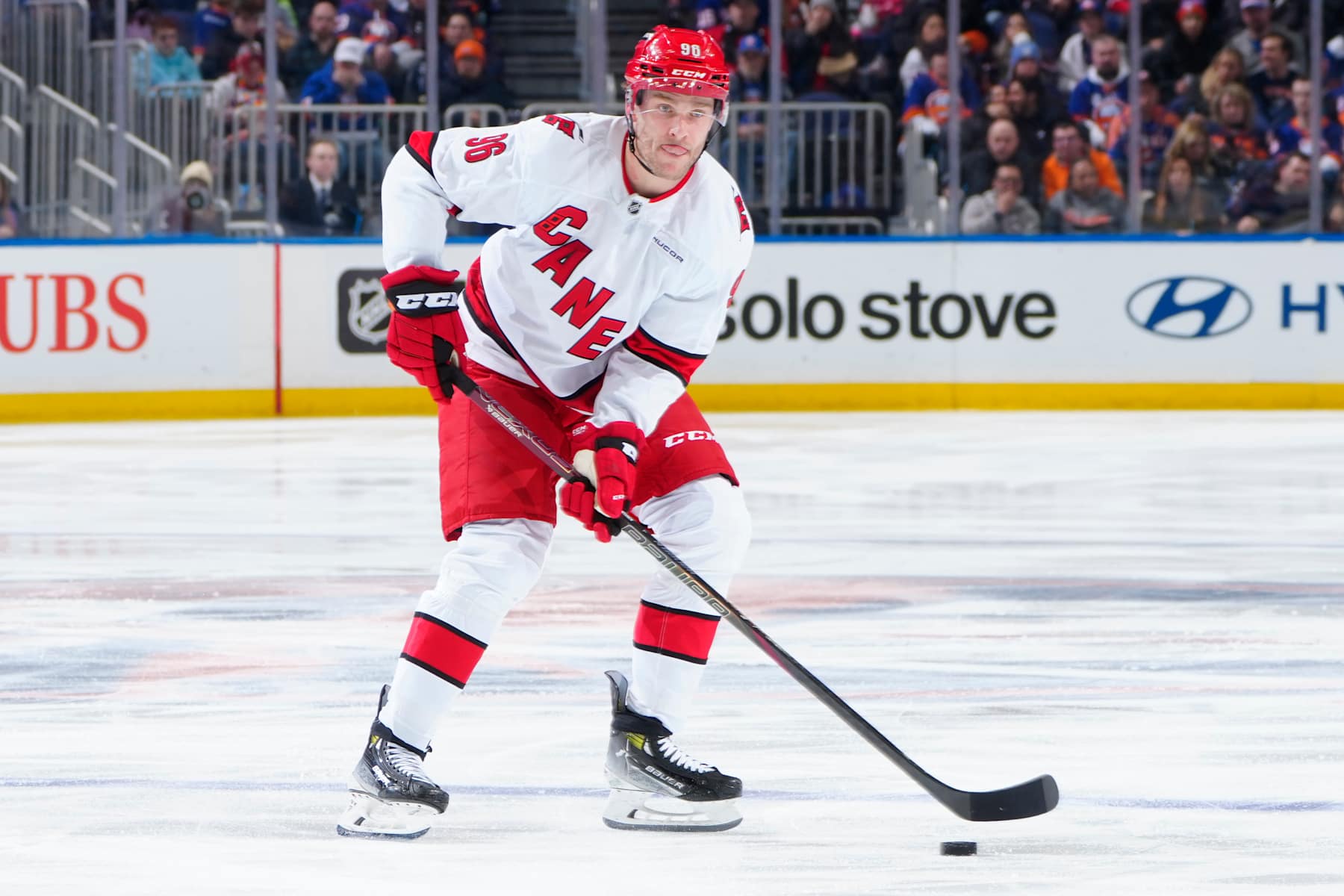 ELMONT, NEW YORK - JANUARY 25: Mikko Rantanen #96 of the Carolina Hurricanes skates with the puck against the New York Islanders during the second period at UBS Arena on January 25, 2025 in Elmont, New York. (Photo by Mike Stobe/NHLI via Getty Images)