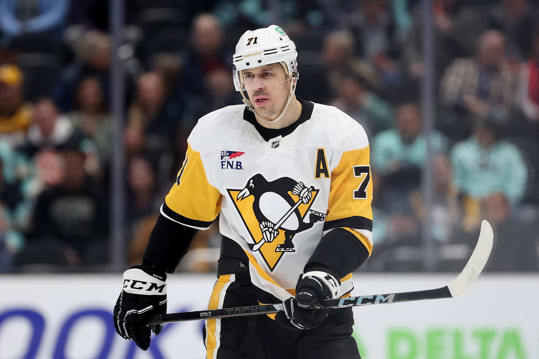 SEATTLE, WASHINGTON - JANUARY 25: Evgeni Malkin #71 of the Pittsburgh Penguins looks on against the Seattle Kraken during the first period at Climate Pledge Arena on January 25, 2025 in Seattle, Washington. (Photo by Steph Chambers/Getty Images)