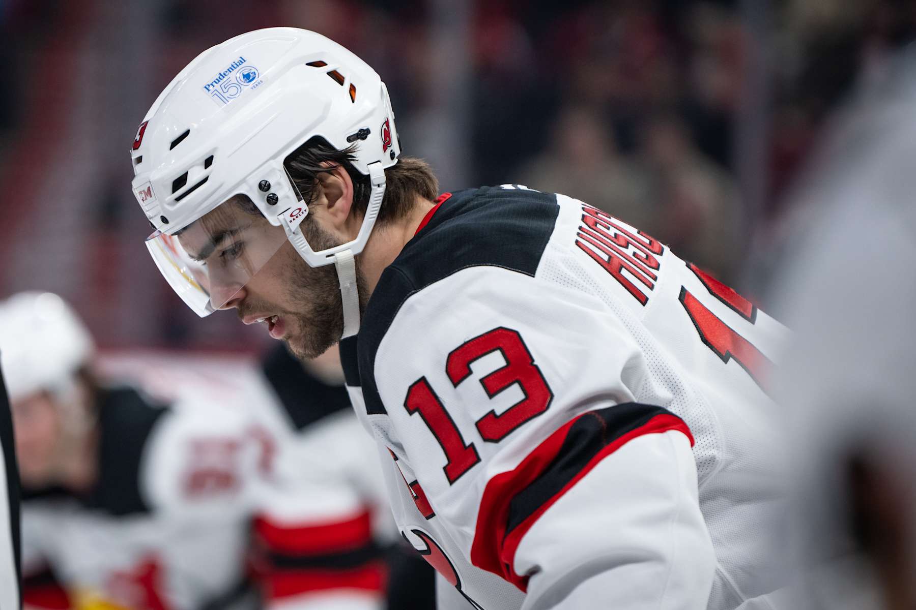 MONTREAL, QC - JANUARY 25: Nico Hischier (13) of the New Jersey Devils lines up for a face off during the first period of the NHL game between the New Jersey Devils and the Montreal Canadiens on Jan 25 2025, at the Bell Centre in Montreal, QC(Photo by Vincent Ethier/Icon Sportswire via Getty Images)