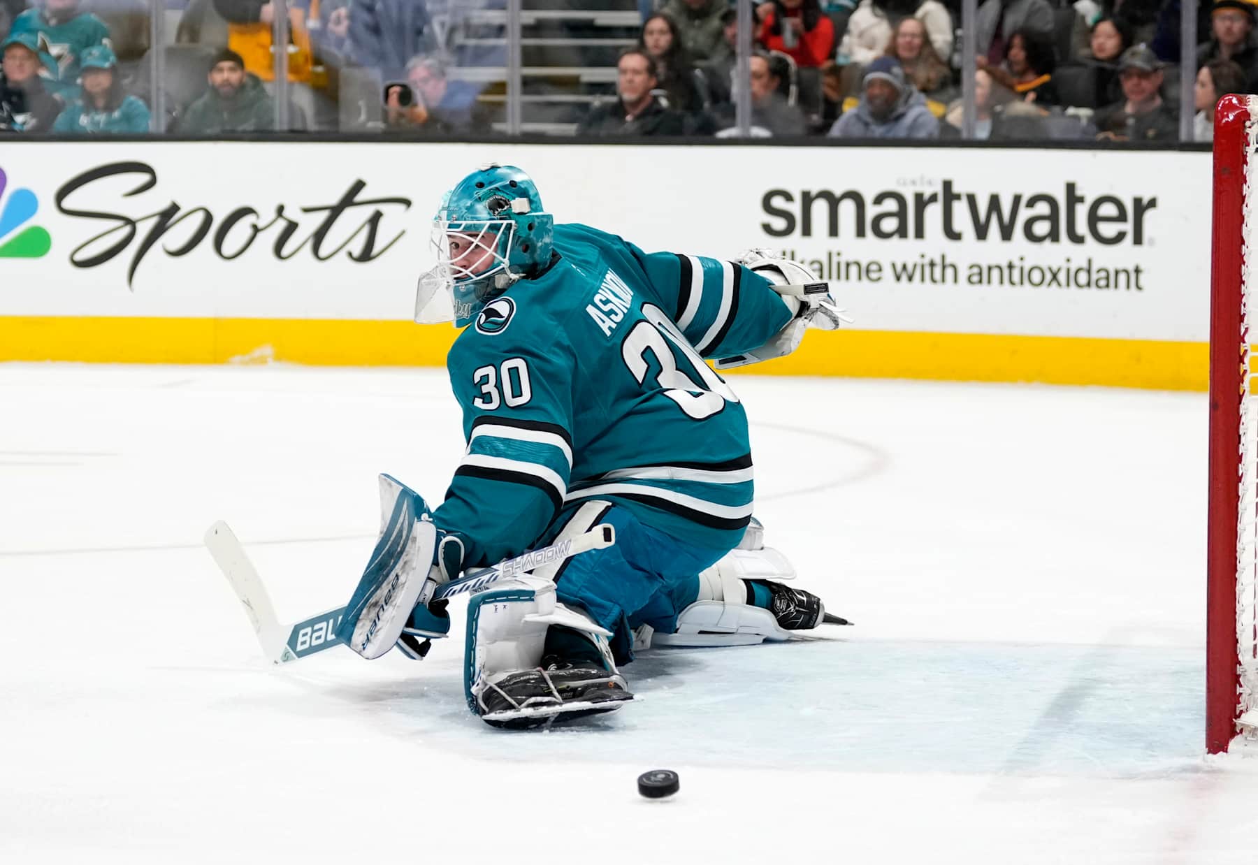 SAN JOSE, CALIFORNIA - JANUARY 27: Goalie Yaroslav Askarov #30 of the San Jose Sharks blocks a shot against the Pittsburgh Penguins during the first period at SAP Center on January 27, 2025 in San Jose, California. (Photo by Thearon W. Henderson/Getty Images)