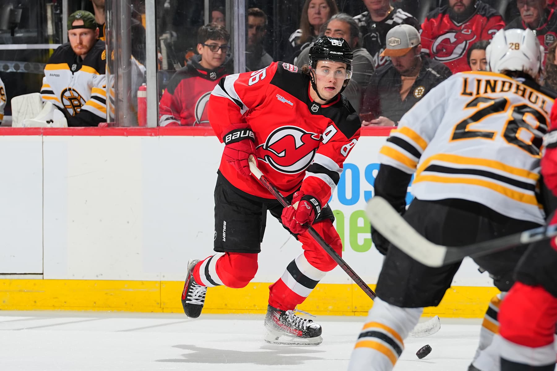NEWARK, NJ - JANUARY 22: Jack Hughes #86 of the New Jersey Devils skates in the first period of the game against the Boston Bruins at the Prudential Center on January 22, 2025 in Newark, New Jersey. (Photo by Rich G1raessle/NHLI via Getty Images)