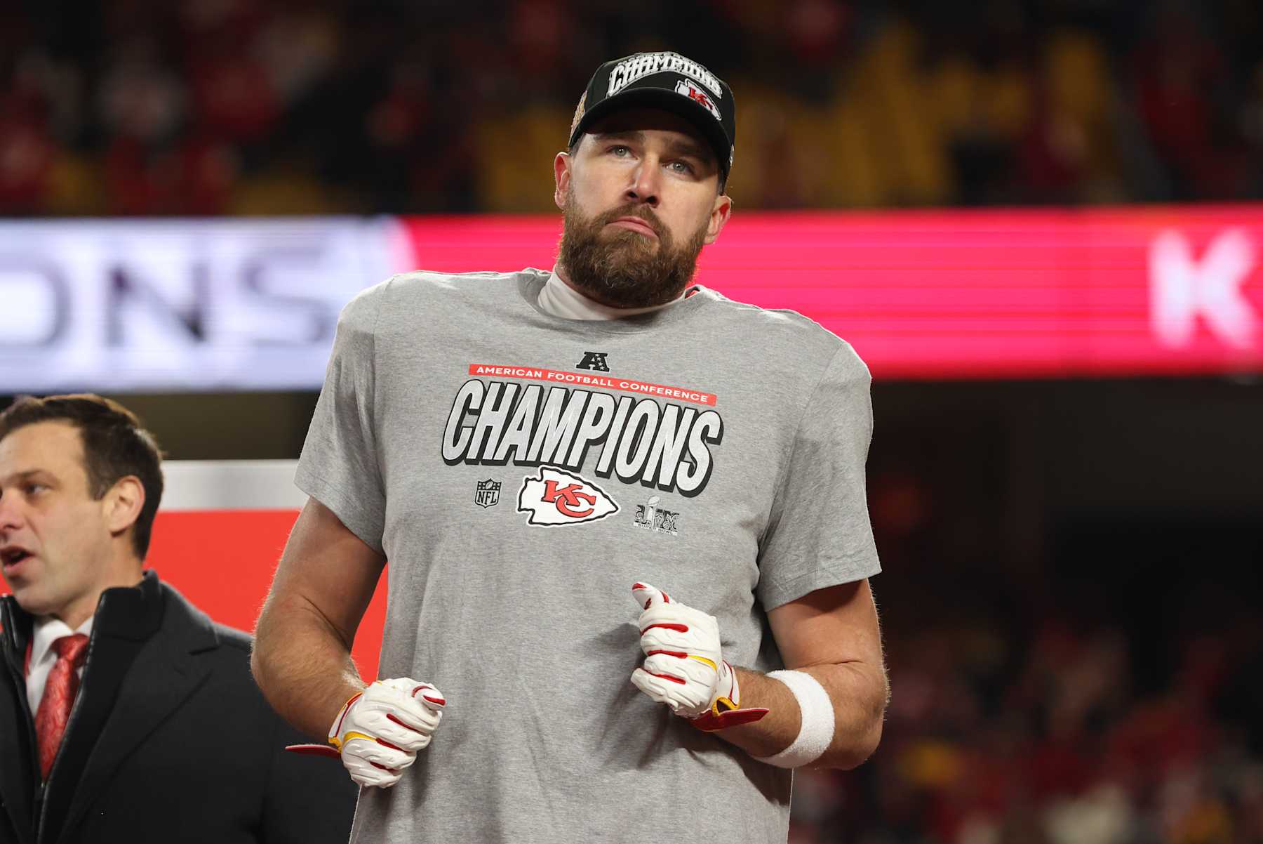 KANSAS CITY, MO - JANUARY 26: Kansas City Chiefs tight end Travis Kelce (87) dances on the stage after winning the AFC Championship game between the Buffalo Bills and Kansas City Chiefs on January 26, 2025 at GEHA Field at Arrowhead Stadium in Kansas City, MO. (Photo by Scott Winters/Icon Sportswire via Getty Images)