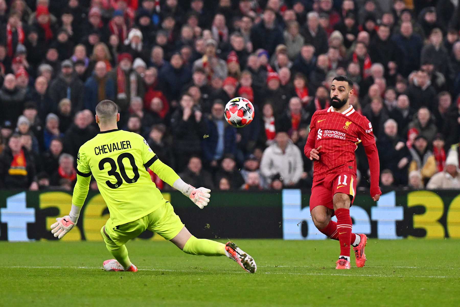 LIVERPOOL, ENGLAND - JANUARY 21: (SUN AND SUN ON SUNDAY OUT) Mohamed Salah of Liverpool scores his team's first goal past Lucas Chevalier of LOSC Lille during the UEFA Champions League 2024/25 League Phase MD7 match between Liverpool FC and LOSC Lille at Anfield on January 21, 2025 in Liverpool, England. (Photo by Liverpool FC/Liverpool FC via Getty Images)