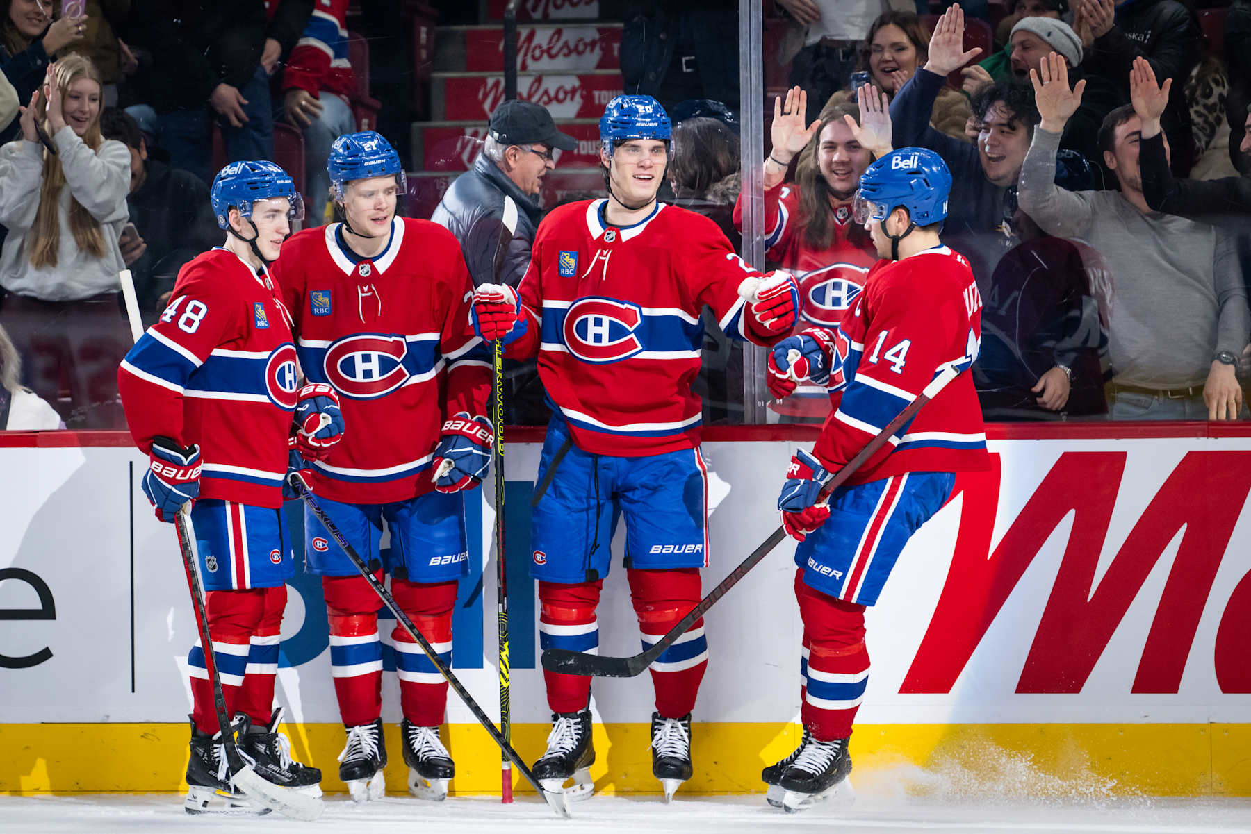 MONTREAL, QC - JANUARY 28: Juraj Slafkovsky (20) of the Montreal Canadiens celebrates with teammates after scoring a goal during the first period of the NHL game between the Winnipeg Jets and the Montreal Canadiens on Jan 28 2025, at the Bell Centre in Montreal, QC(Photo by Vincent Ethier/Icon Sportswire via Getty Images)