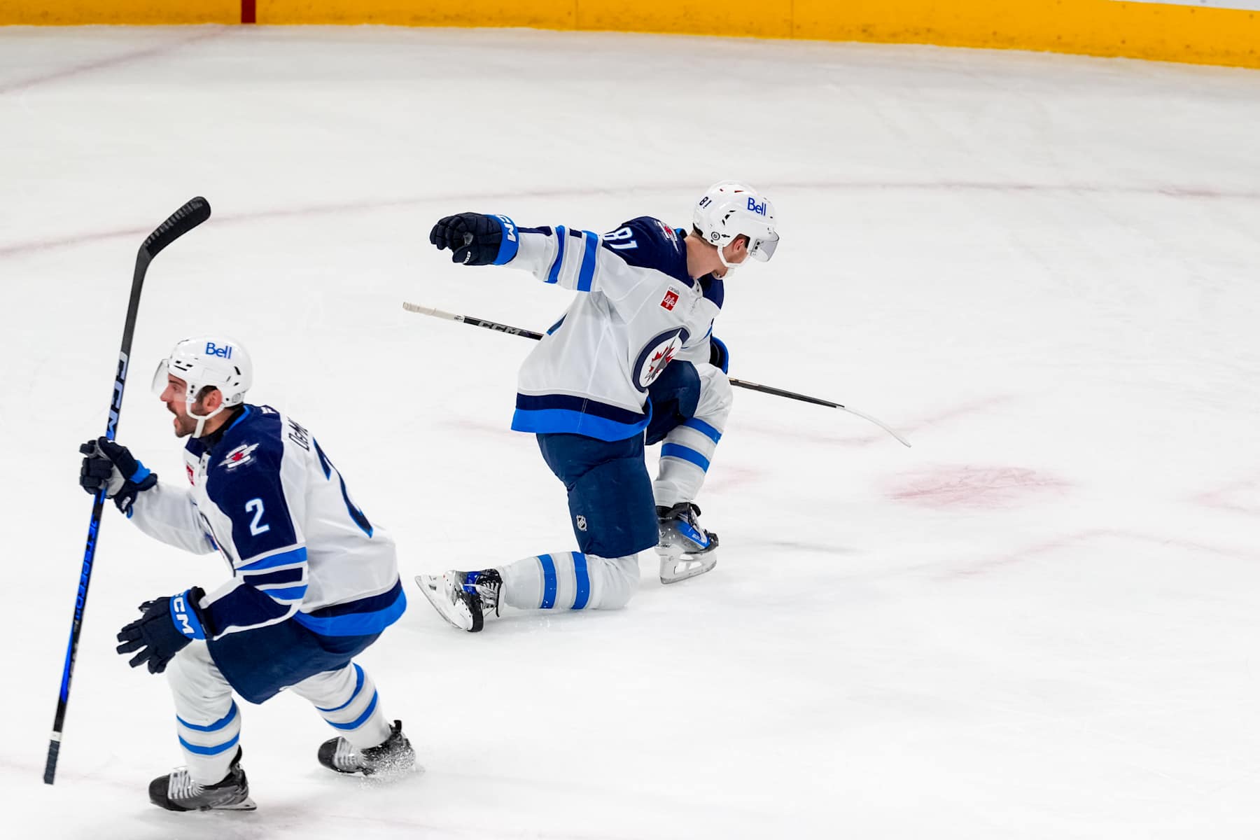 MONTREAL, QUEBEC - JANUARY 28: Kyle Connor #81 of the Winnipeg Jets and teammate Dylan DeMelo #2 celebrate a goal in the second period of a game against the Montreal Canadiens at Bell Centre on January 28, 2025 in Montreal, Quebec. (Photo by Reuben Polansky-Shapiro/NHLI via Getty Images)