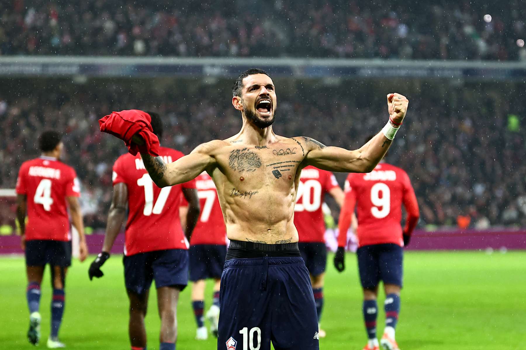 Lille's French midfielder #10 Remy Cabella celebrates scoring his team's sixth goal during the UEFA Champions League, league phase - matchday 8 football match between Lille OSC (LOSC) and Feyenoord Rotterdam at the Stade Pierre-Mauroy in Villeneuve-d'Ascq in Northern France, on January 29, 2025. (Photo by Sameer Al-Doumy / AFP) (Photo by SAMEER AL-DOUMY/AFP via Getty Images)
