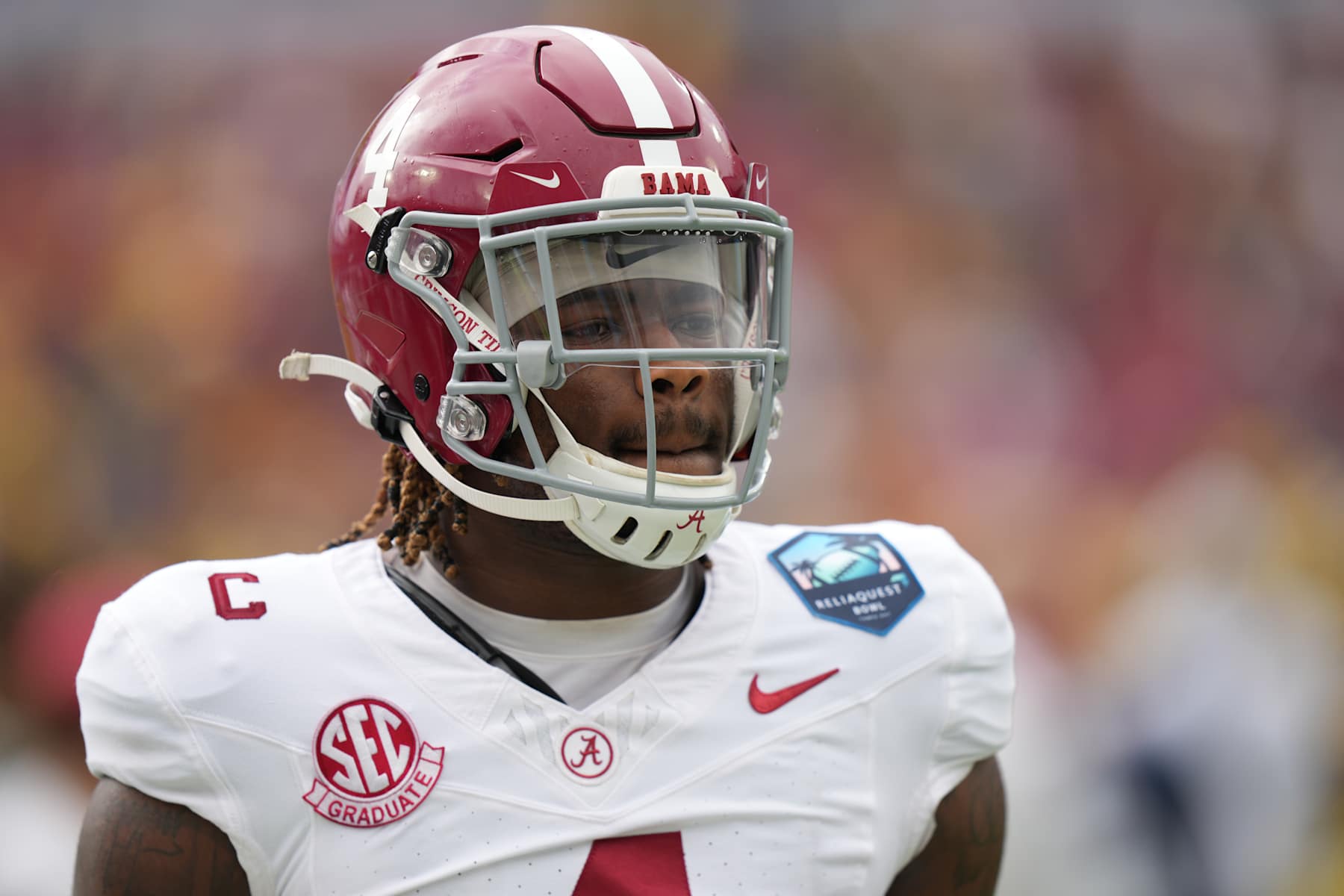 TAMPA, FL - DECEMBER 31: Alabama Crimson Tide quarterback Jalen Milroe (4) warms up before  the ReliaQuest Bowl game between the Michigan Wolverines and the Alabama Crimson Tide on Tuesday, December 31, 2024 at Raymond James Stadium in Tampa, Fla. (Photo by Peter Joneleit/Icon Sportswire via Getty Images)
