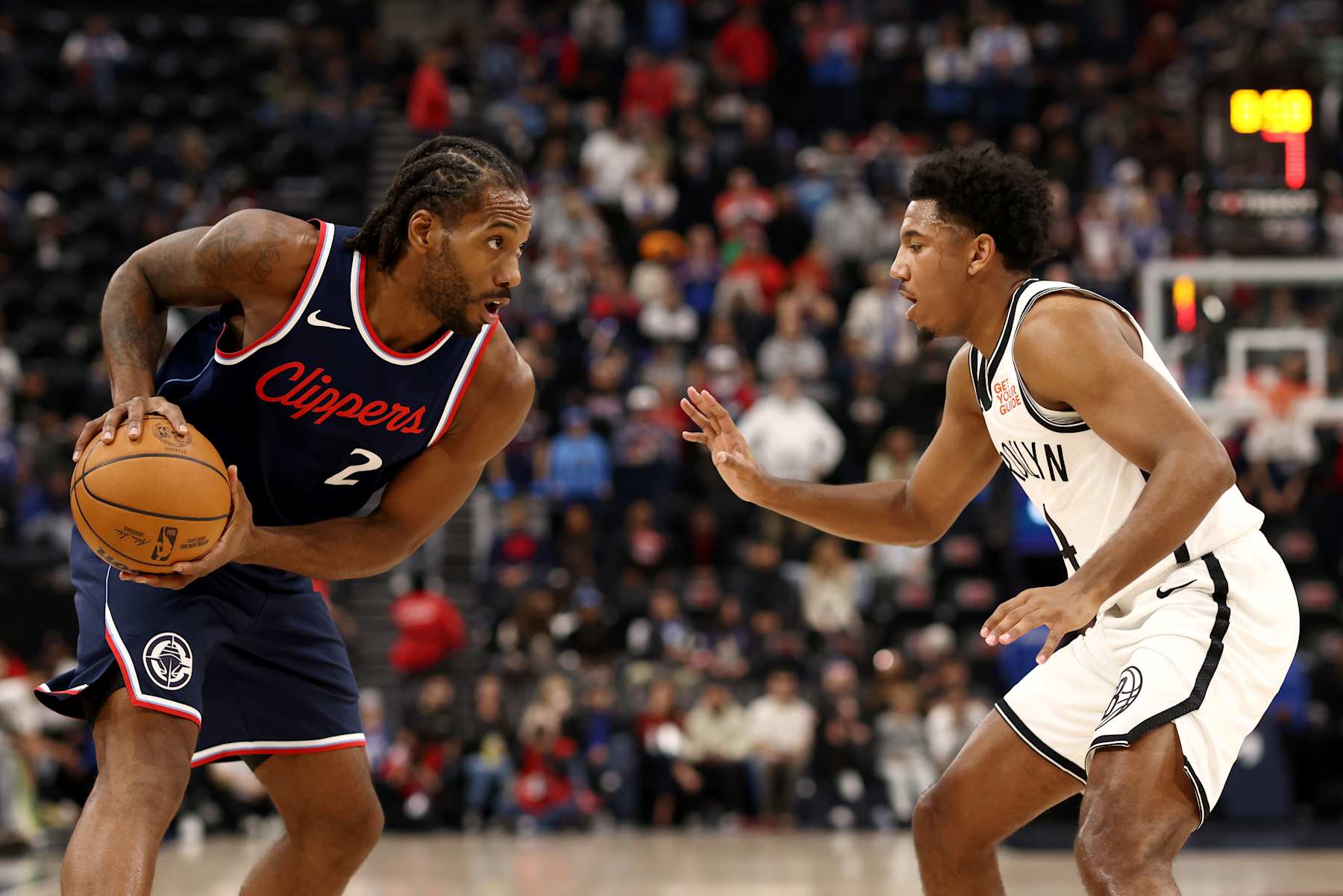 INGLEWOOD, CALIFORNIA - JANUARY 15: Kawhi Leonard #2 of the Los Angeles Clippers looks to pass the ball against Reece Beekman #4 of the Brooklyn Nets during the second quarter at Intuit Dome on January 15, 2025 in Inglewood, California. NOTE TO USER: User expressly acknowledges and agrees that, by downloading and/or using this Photograph, user is consenting to the terms and conditions of the Getty Images License Agreement. (Photo by Katelyn Mulcahy/Getty Images)
