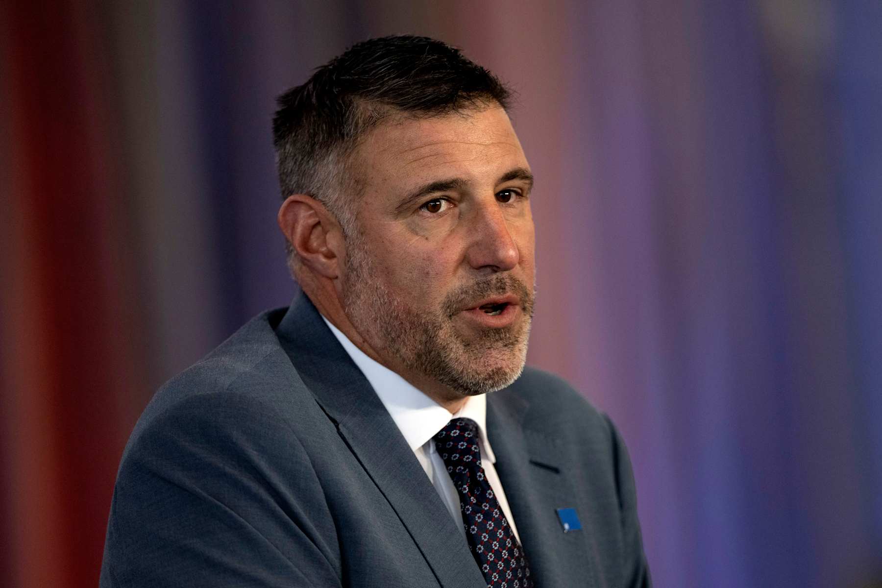 FOXBOROUGH, MASSACHUSETTS - JANUARY 13: Mike Vrabel speaks as he is introduced as head coach of the New England Patriots during a press conference at Gillette Stadium on January 13, 2025 in Foxborough, Massachusetts. (Photo by Billie Weiss/Getty Images)