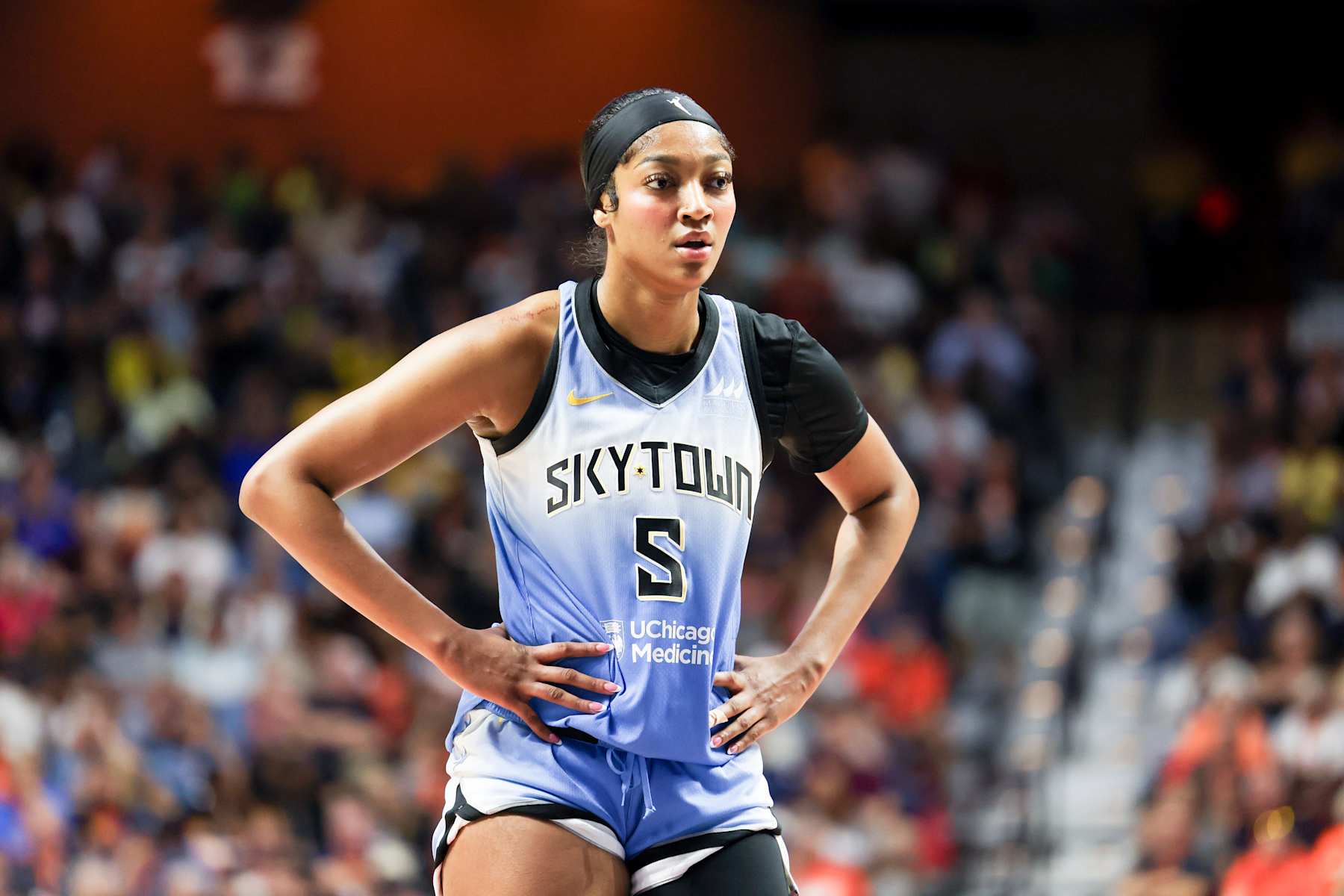 UNCASVILLE, CT - AUGUST 23: Angel Reese #5 of the Chicago Sky looks on during the game on August 23, 2024 at the Mohegan Sun Arena in Uncasville, Connecticut. NOTE TO USER: User expressly acknowledges and agrees that, by downloading and or using this photograph, User is consenting to the terms and conditions of the Getty Images License Agreement. Mandatory Copyright Notice: Copyright 2024 NBAE (Photo by Dylan Goodman/NBAE via Getty Images)