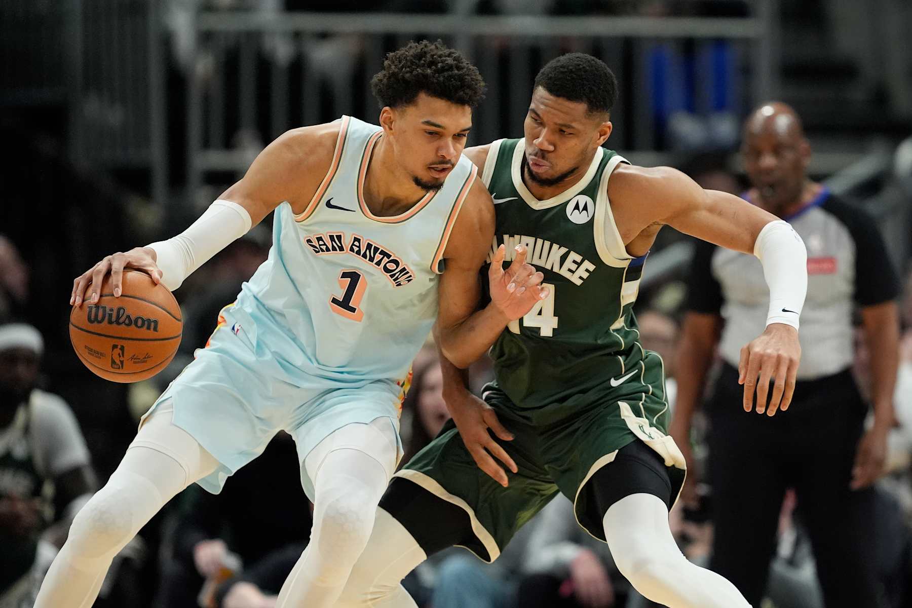 MILWAUKEE, WISCONSIN - JANUARY 08: Giannis Antetokounmpo #34 of the Milwaukee Bucks defends Victor Wembanyama #1 of the San Antonio Spurs during the second quarter at Fiserv Forum on January 08, 2025 in Milwaukee, Wisconsin. NOTE TO USER: User expressly acknowledges and agrees that, by downloading and or using this photograph, User is consenting to the terms and conditions of the Getty Images License Agreement. (Photo by Patrick McDermott/Getty Images)