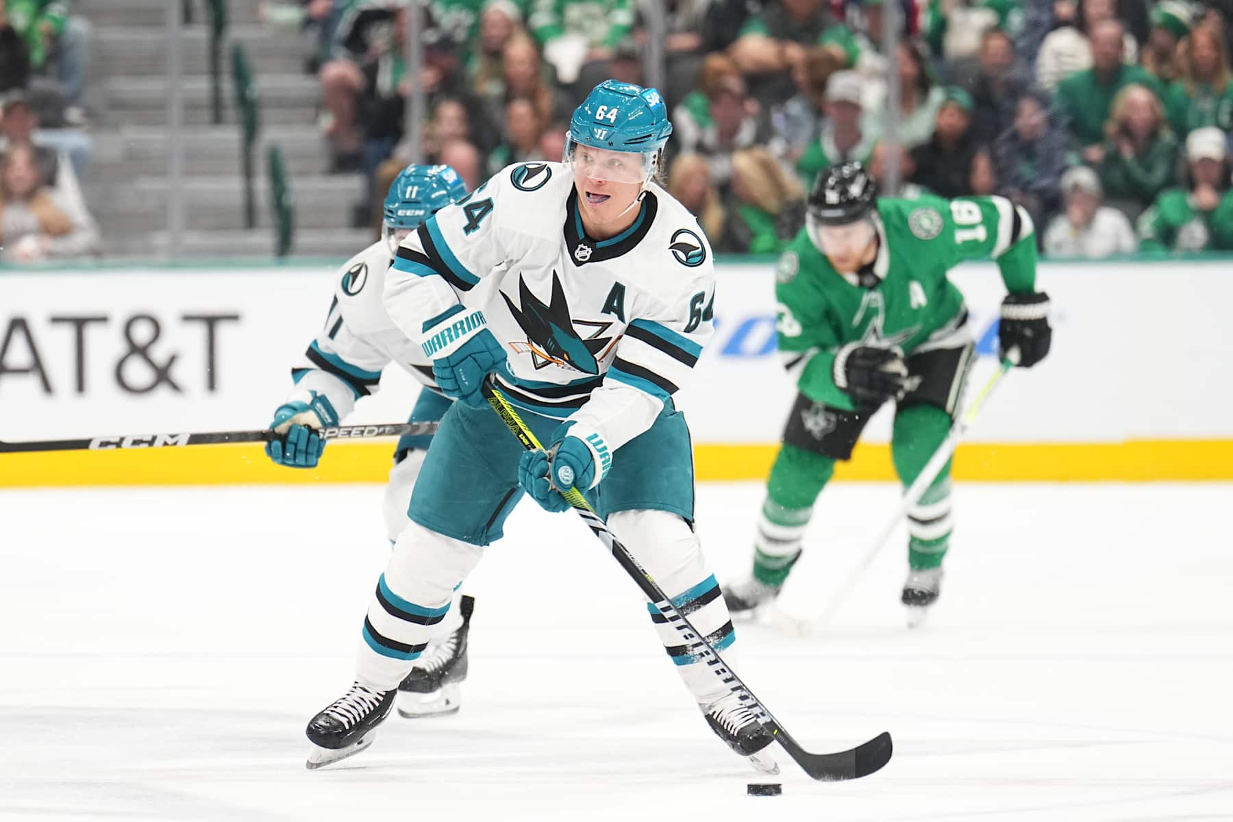 DALLAS, TX - MARCH 02: Mikael Granlund #64 of the San Jose Sharks handles the puck against the Dallas Stars at the American Airlines Center on March 02, 2024 in Dallas, Texas. (Photo by Glenn James/NHLI via Getty Images)
