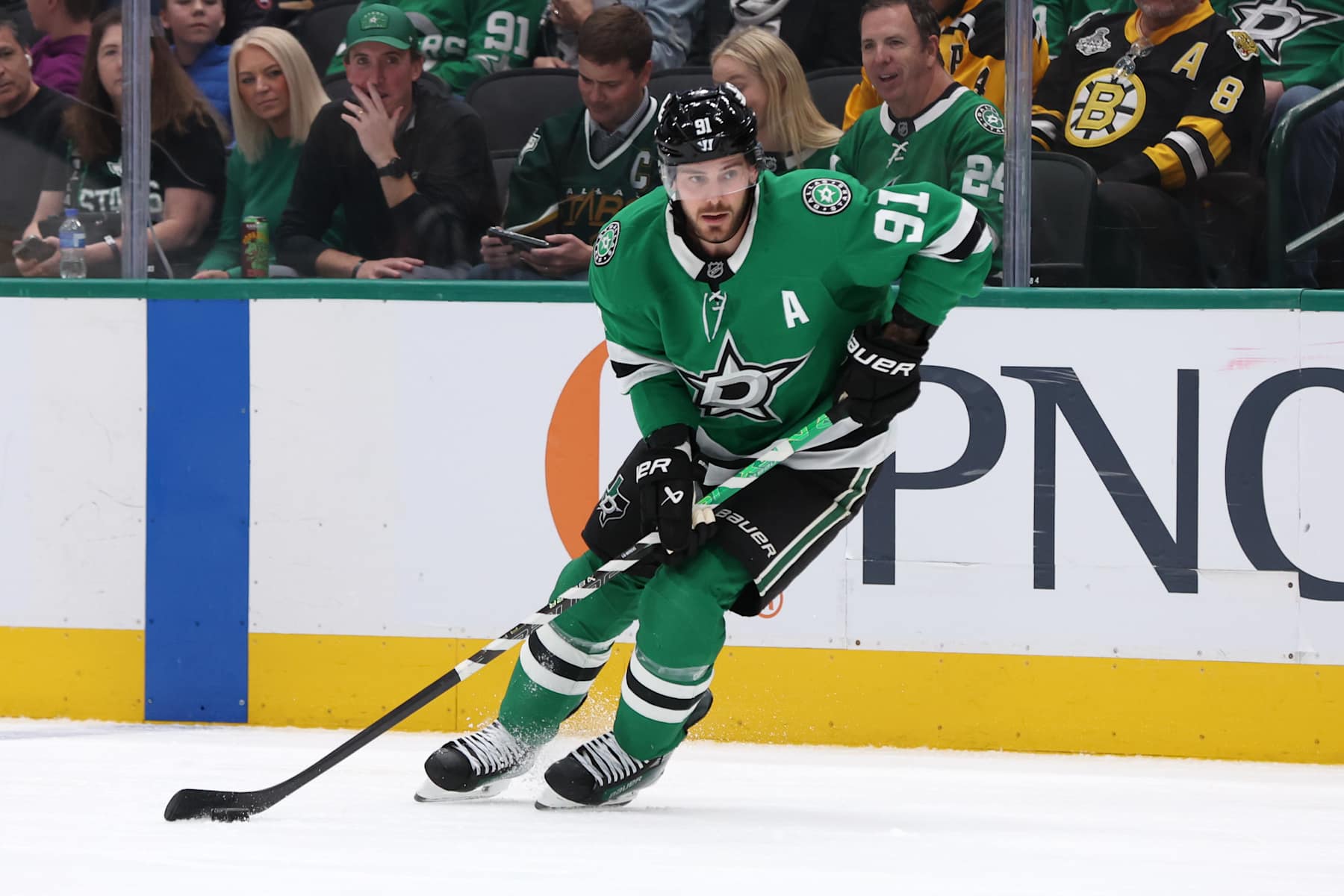 DALLAS, TEXAS - NOVEMBER 14: Tyler Seguin #91 of the Dallas Stars skates with the puck during the first period against the Boston Bruins at American Airlines Center on November 14, 2024 in Dallas, Texas. (Photo by Sam Hodde/Getty Images)