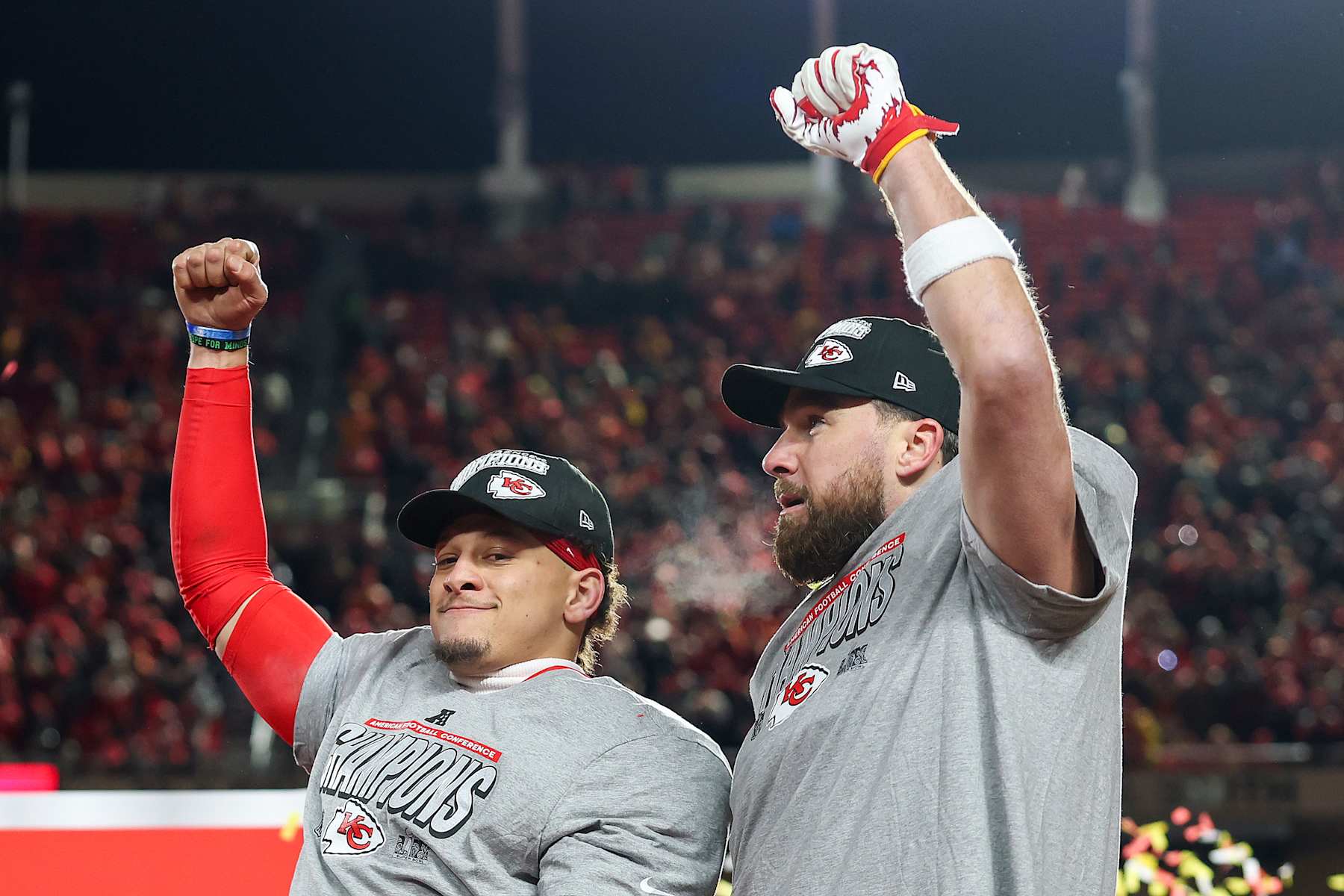 KANSAS CITY, MISSOURI - JANUARY 26: Patrick Mahomes #15 and Travis Kelce #87 of the Kansas City Chiefs celebrate after defeating the Buffalo Bills 32-29 in the AFC Championship Game at GEHA Field at Arrowhead Stadium on January 26, 2025 in Kansas City, Missouri. (Photo by Jamie Squire/Getty Images)