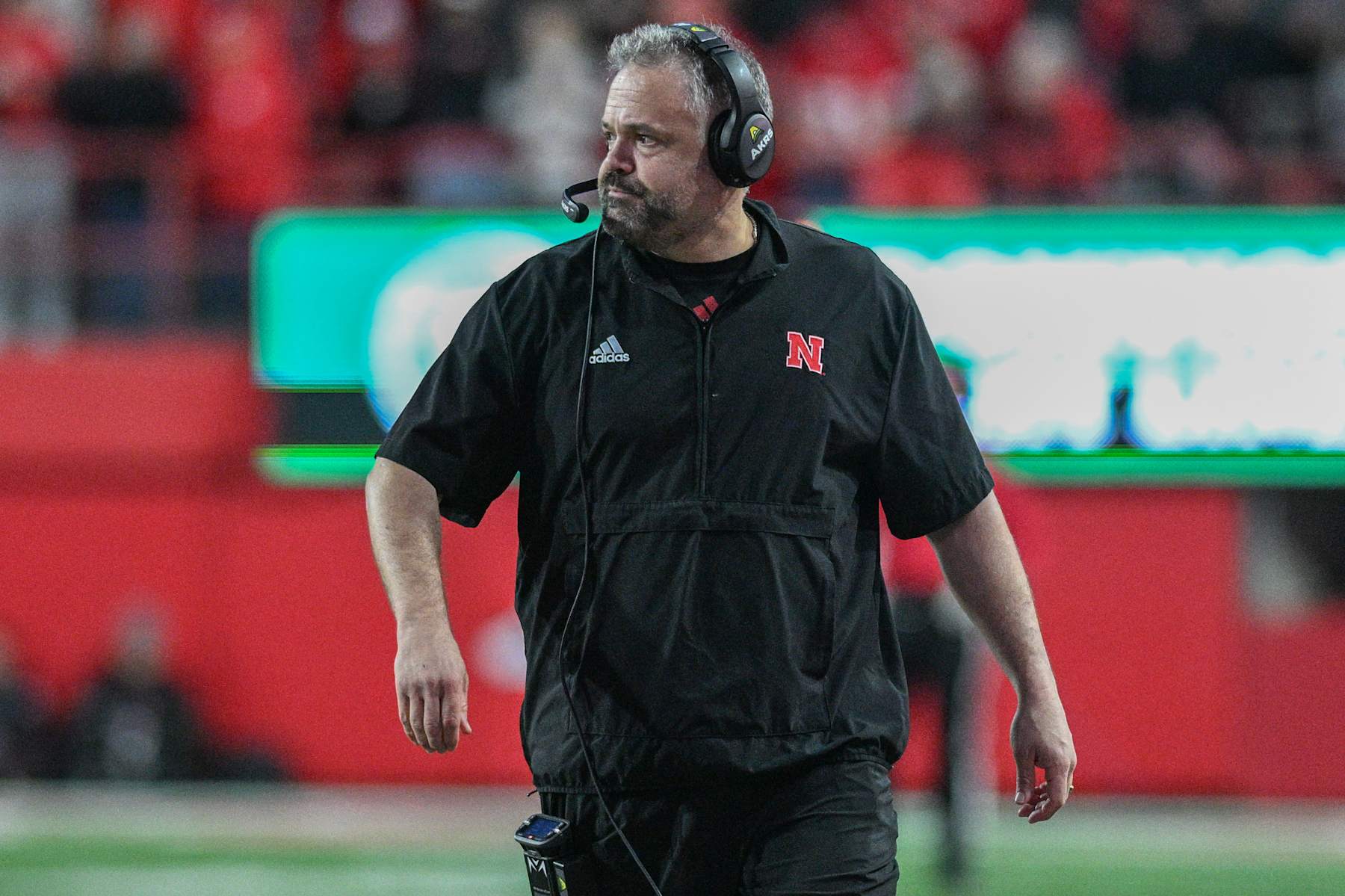 LINCOLN, NEBRASKA - NOVEMBER 23: Head coach Matt Rhule of the Nebraska Cornhuskers on the field against the Wisconsin Badgers at Memorial Stadium on November 23, 2024 in Lincoln, Nebraska.  (Photo by Steven Branscombe/Getty Images)