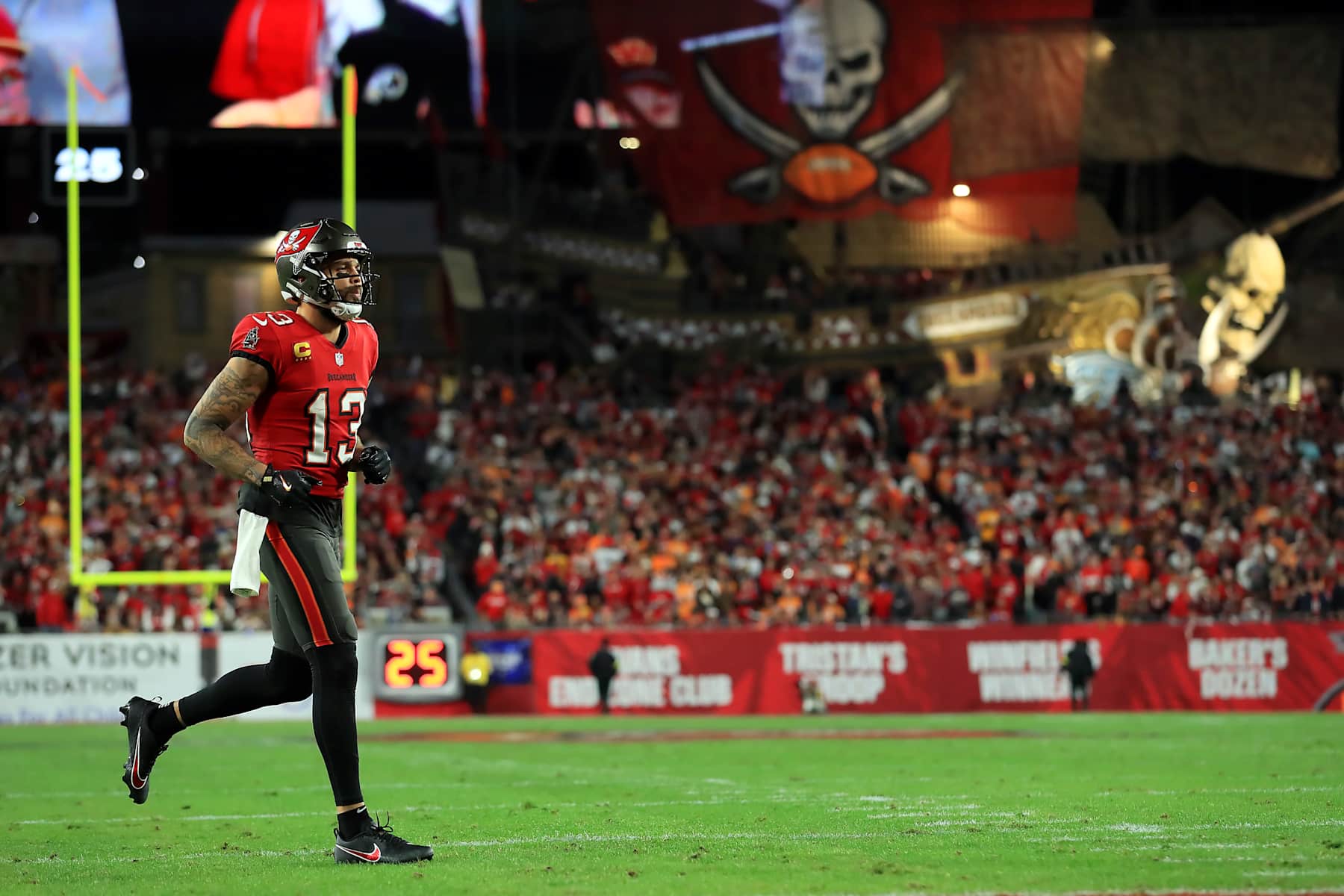 TAMPA, FL - JANUARY 12: Tampa Bay Buccaneers Wide Receiver Mike Evans (13) trots onto the field during the NFC Wild Card Playoff game between the Washington Commanders and the Tampa Bay Buccaneers on January 12, 2025 at Raymond James Stadium in Tampa, Florida. (Photo by Cliff Welch/Icon Sportswire via Getty Images)