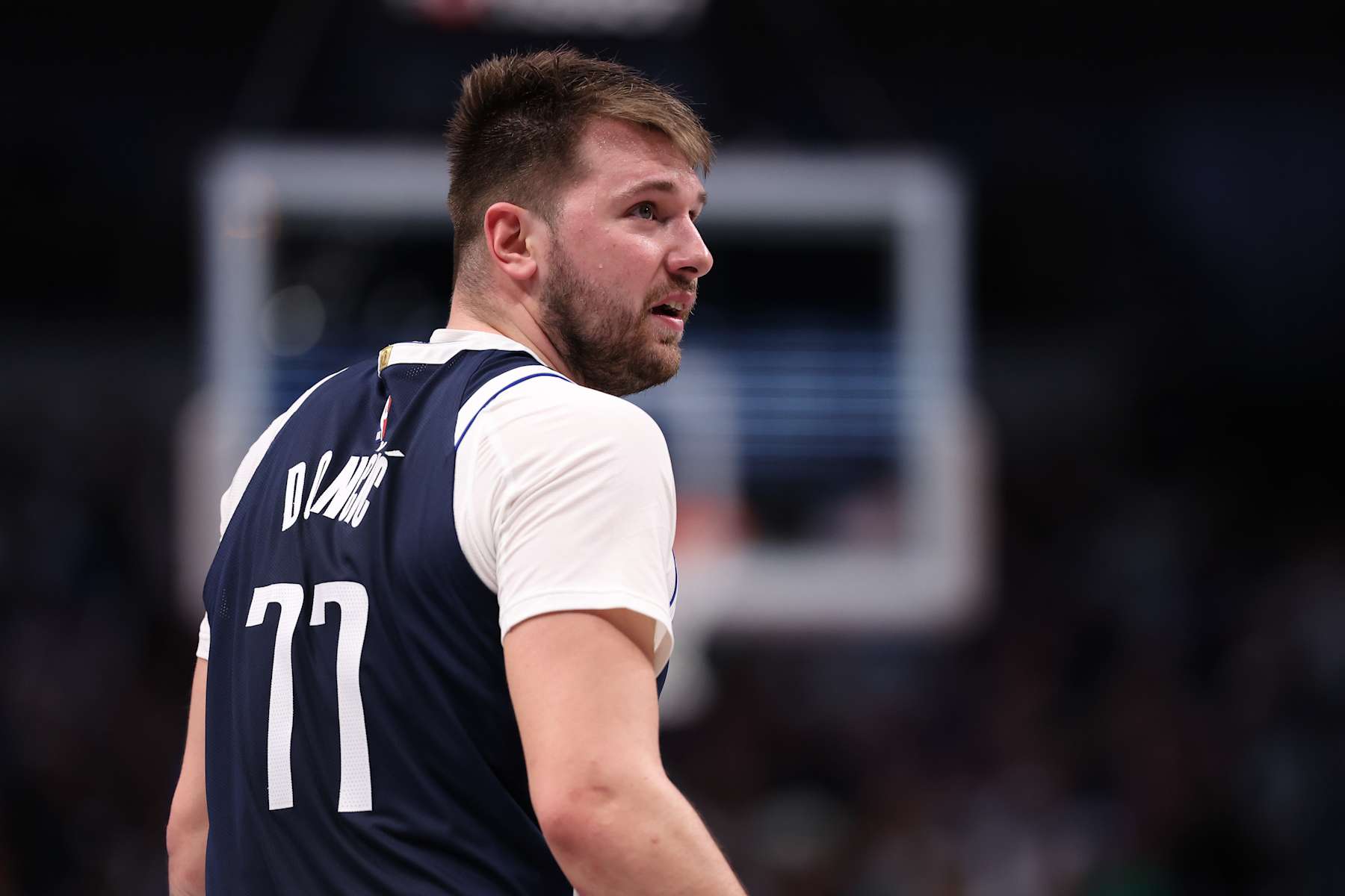 DALLAS, TEXAS - DECEMBER 23: Luka Doncic #77 of the Dallas Mavericks looks on during the second half against the Portland Trail Blazers at American Airlines Center on December 23, 2024 in Dallas, Texas. NOTE TO USER: User expressly acknowledges and agrees that, by downloading and/or using this photograph, user is consenting to the terms and conditions of the Getty Images License Agreement. (Photo by Sam Hodde/Getty Images)