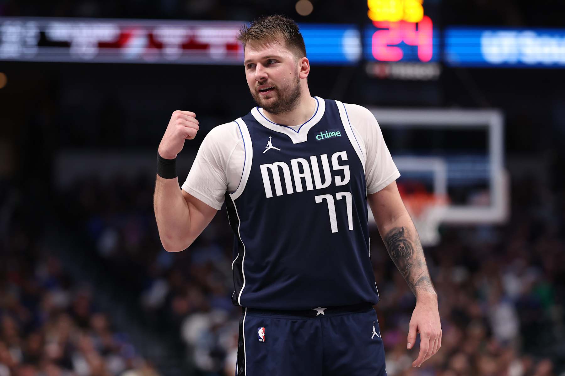 DALLAS, TEXAS - DECEMBER 23: Luka Doncic #77 of the Dallas Mavericks reacts during the second half against the Portland Trail Blazers at American Airlines Center on December 23, 2024 in Dallas, Texas. NOTE TO USER: User expressly acknowledges and agrees that, by downloading and/or using this photograph, user is consenting to the terms and conditions of the Getty Images License Agreement. (Photo by Sam Hodde/Getty Images)