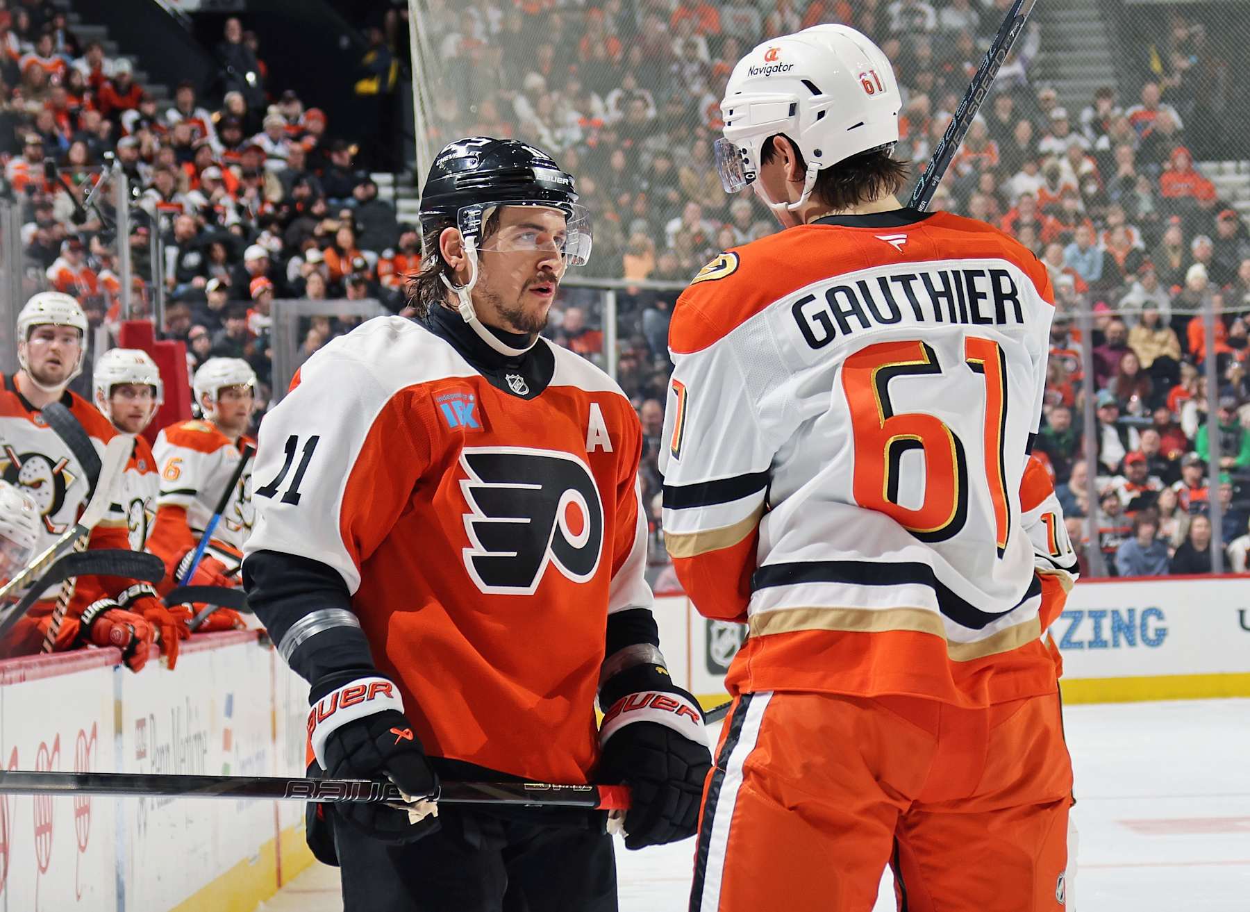 PHILADELPHIA, PENNSYLVANIA - JANUARY 11: Travis Konecny #11 of the Philadelphia Flyers stares down Cutter Gauthier #61 of the Anaheim Ducks during the second period at the Wells Fargo Center on January 11, 2025 in Philadelphia, Pennsylvania. (Photo by Len Redkoles/NHLI via Getty Images)