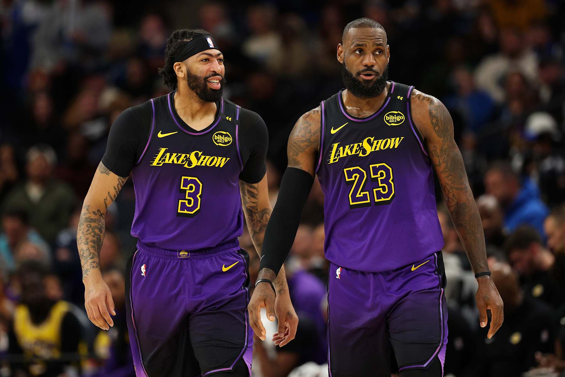 MINNEAPOLIS, MINNESOTA - DECEMBER 02: Anthony Davis #3 and LeBron James #23 of the Los Angeles Lakers look on against the Minnesota Timberwolves in the second quarter at Target Center on December 02, 2024 in Minneapolis, Minnesota. The Timberwolves defeated the Lakers 109-80. NOTE TO USER: User expressly acknowledges and agrees that, by downloading and or using this photograph, User is consenting to the terms and conditions of the Getty Images License Agreement. (Photo by David Berding/Getty Images)