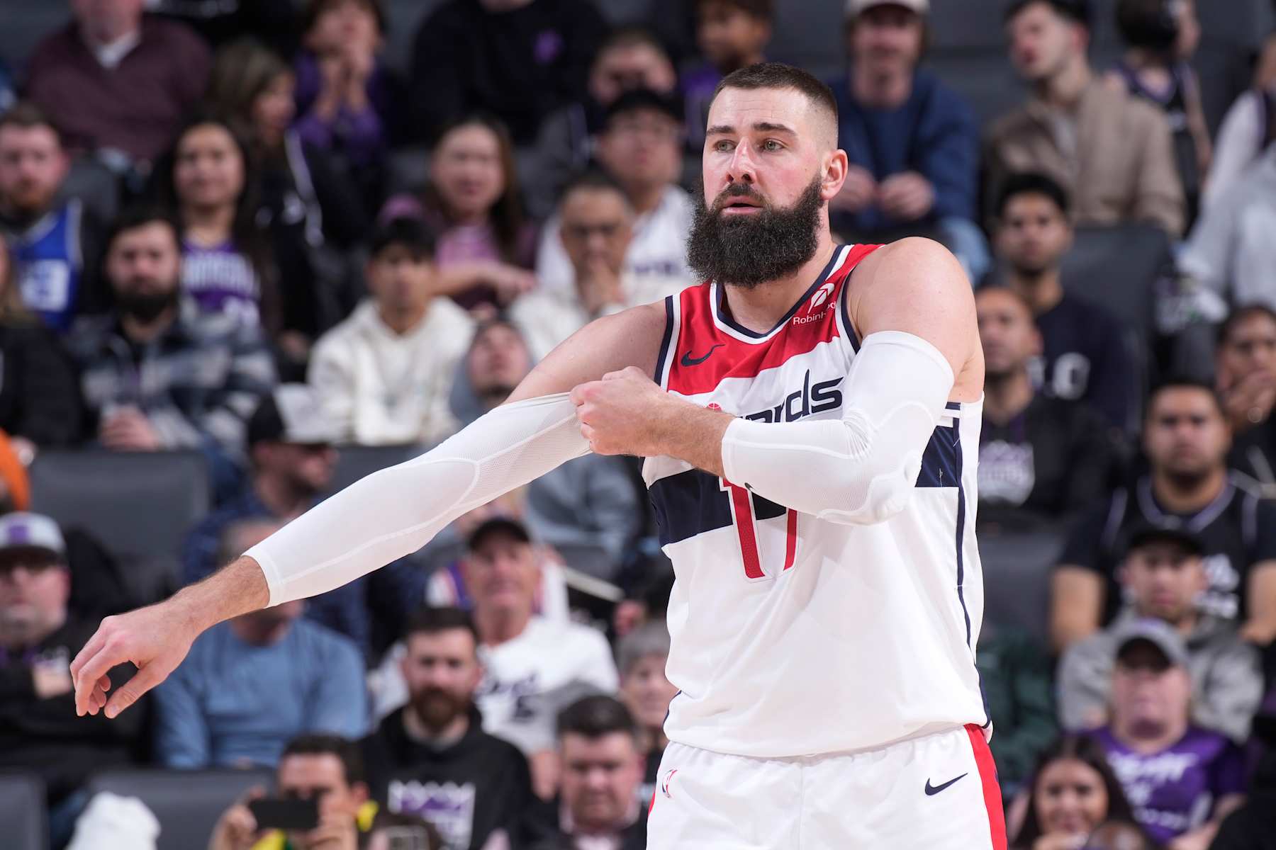 SACRAMENTO, CA - JANUARY 19: Jonas Valanciunas #17 of the Washington Wizards adjusts his shooting sleeve during the game against the Sacramento Kings on January 19, 2025 at Golden 1 Center in Sacramento, California. NOTE TO USER: User expressly acknowledges and agrees that, by downloading and or using this photograph, User is consenting to the terms and conditions of the Getty Images Agreement. Mandatory Copyright Notice: Copyright 2025 NBAE (Photo by Rocky Widner/NBAE via Getty Images)