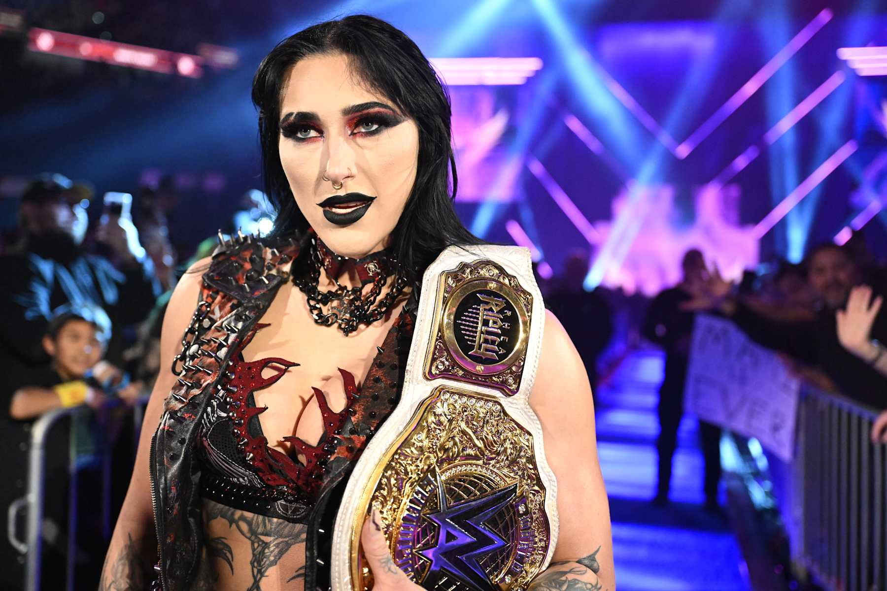 SAN ANTONIO, TEXAS - JANUARY 25: Women's World Champion Rhea Ripley makes her entrance during Saturday Night's Main Event at Frost Bank Center on January 25, 2025 in San Antonio, Texas. (Photo by WWE/Getty Images)