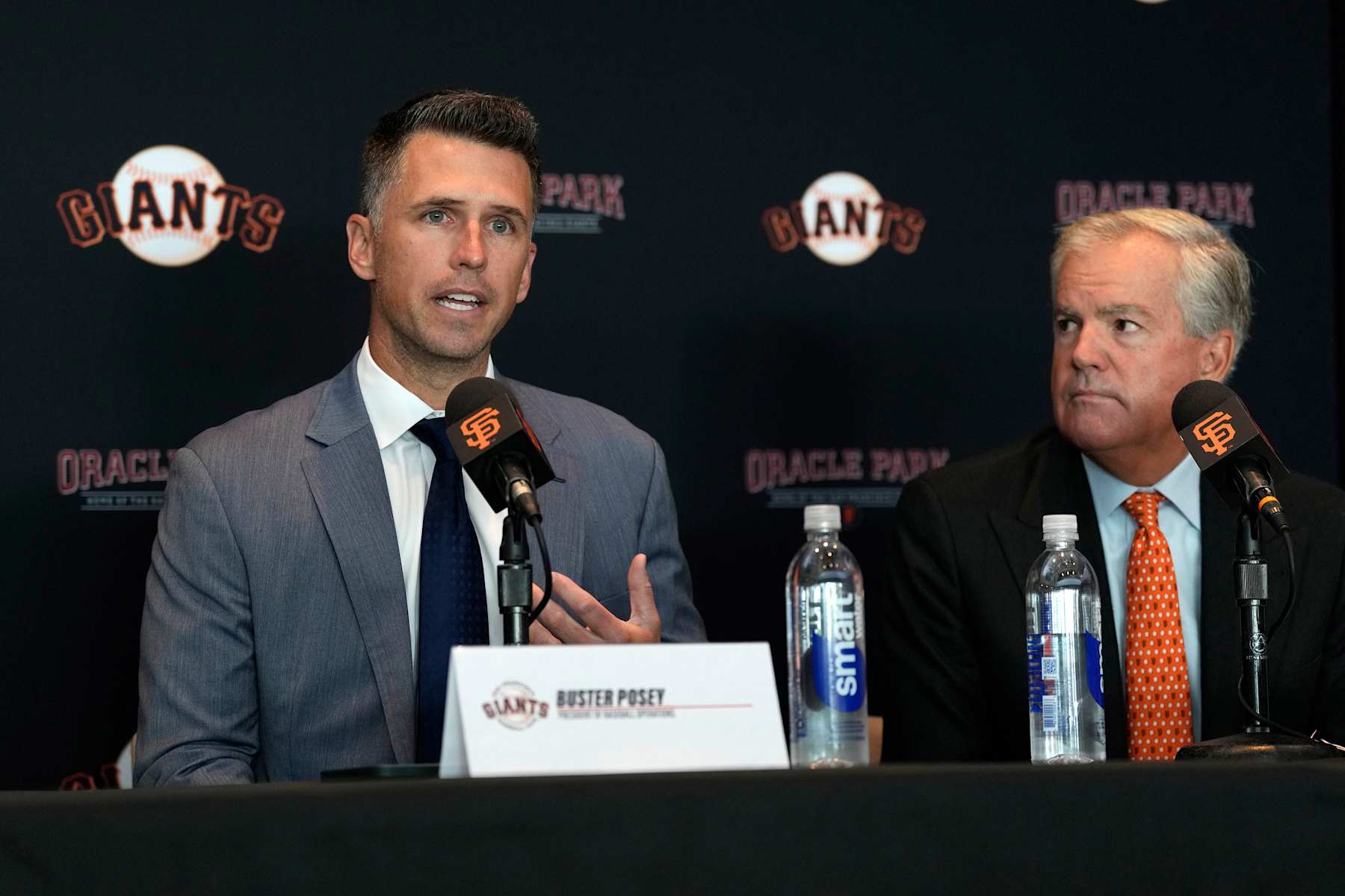 Buster Posey (left) and Greg Johnson in October 2024