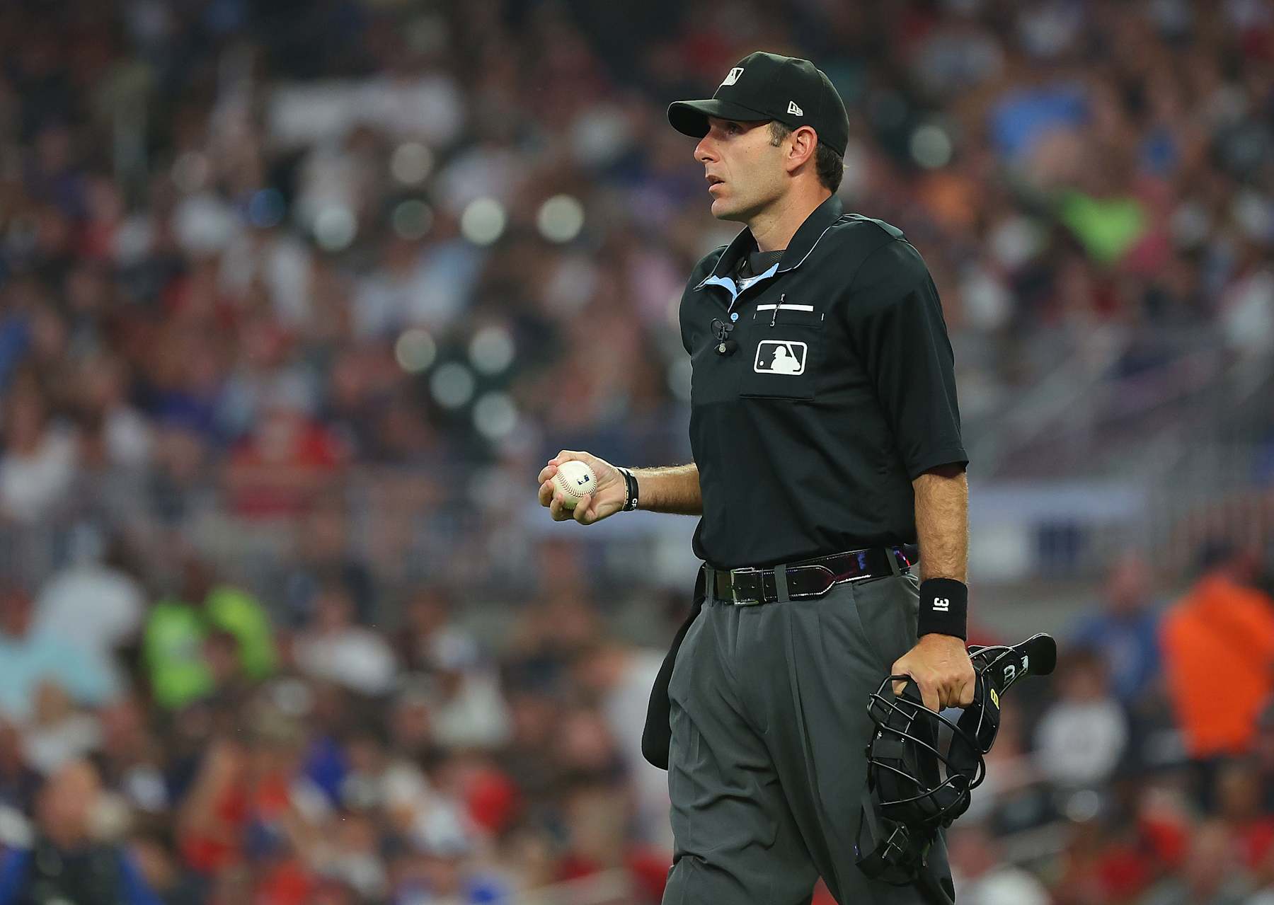 ATLANTA, GEORGIA - JULY 18: Homeplate umpire Pat Hoberg #31 pauses the game in the sixth inning between the Atlanta Braves and the Arizona Diamondbacks at Truist Park on July 18, 2023 in Atlanta, Georgia. (Photo by Kevin C. Cox/Getty Images)