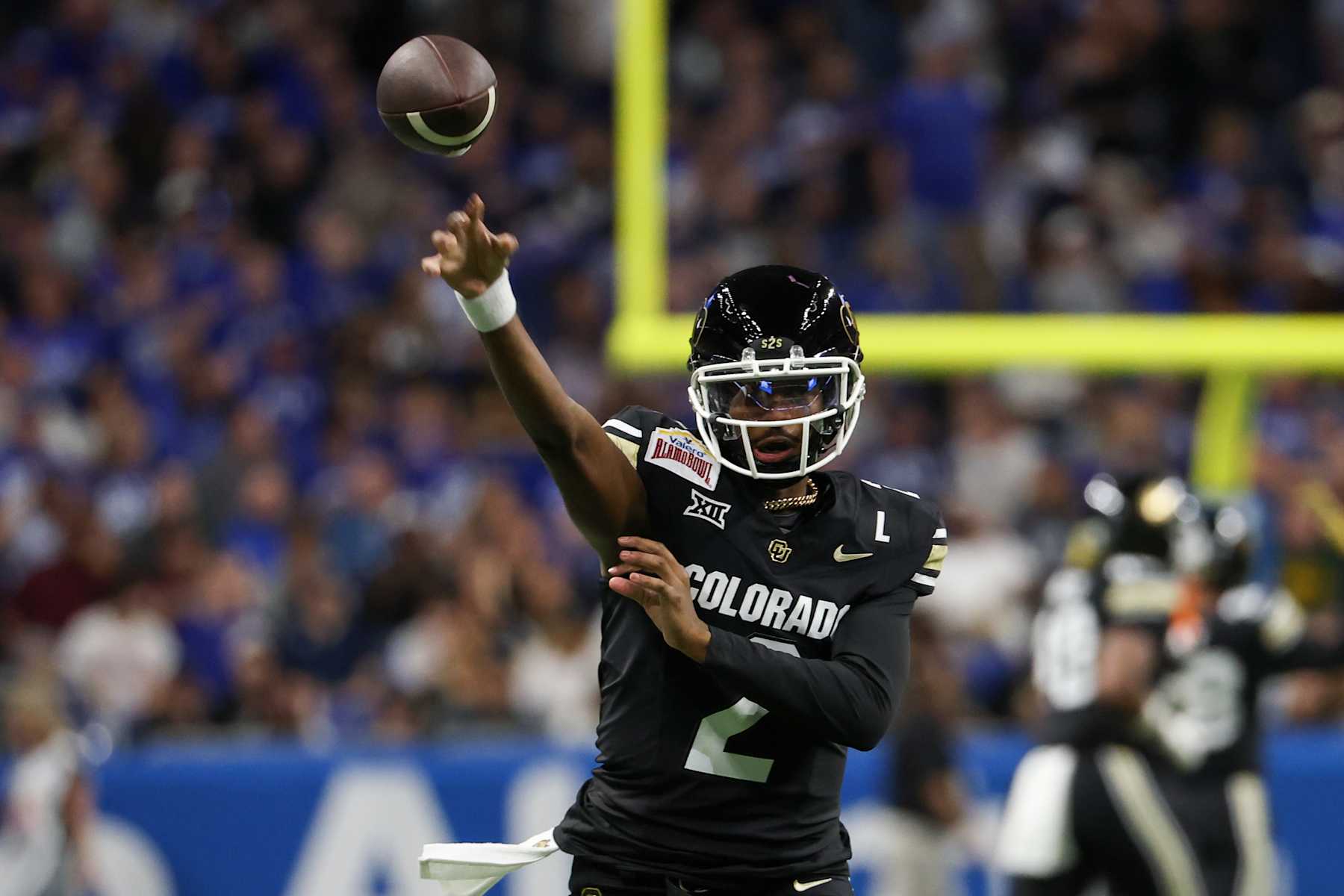 SAN ANTONIO, TX - DECEMBER 28: Colorado Buffaloes quarterback Shedeur Sanders (2) throws a warm up pass before the football game between BYU Cougars and Colorado Buffalos on December 28, 2024, at the Alamodome in San Antonio, Texas. (Photo by David Buono/Icon Sportswire via Getty Images)